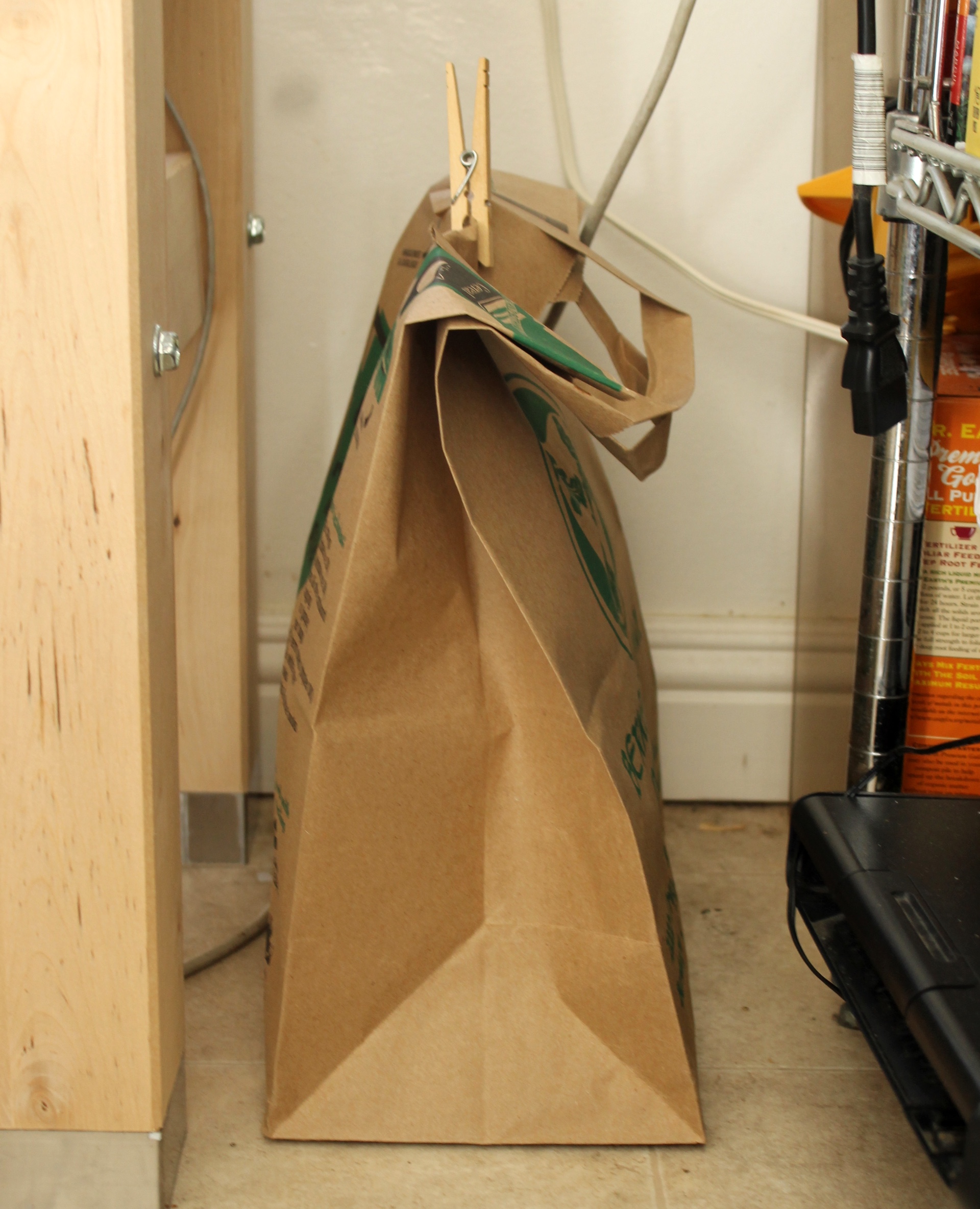 Place the bottles in a paper bag or cardboard box to carbonate in darkness.