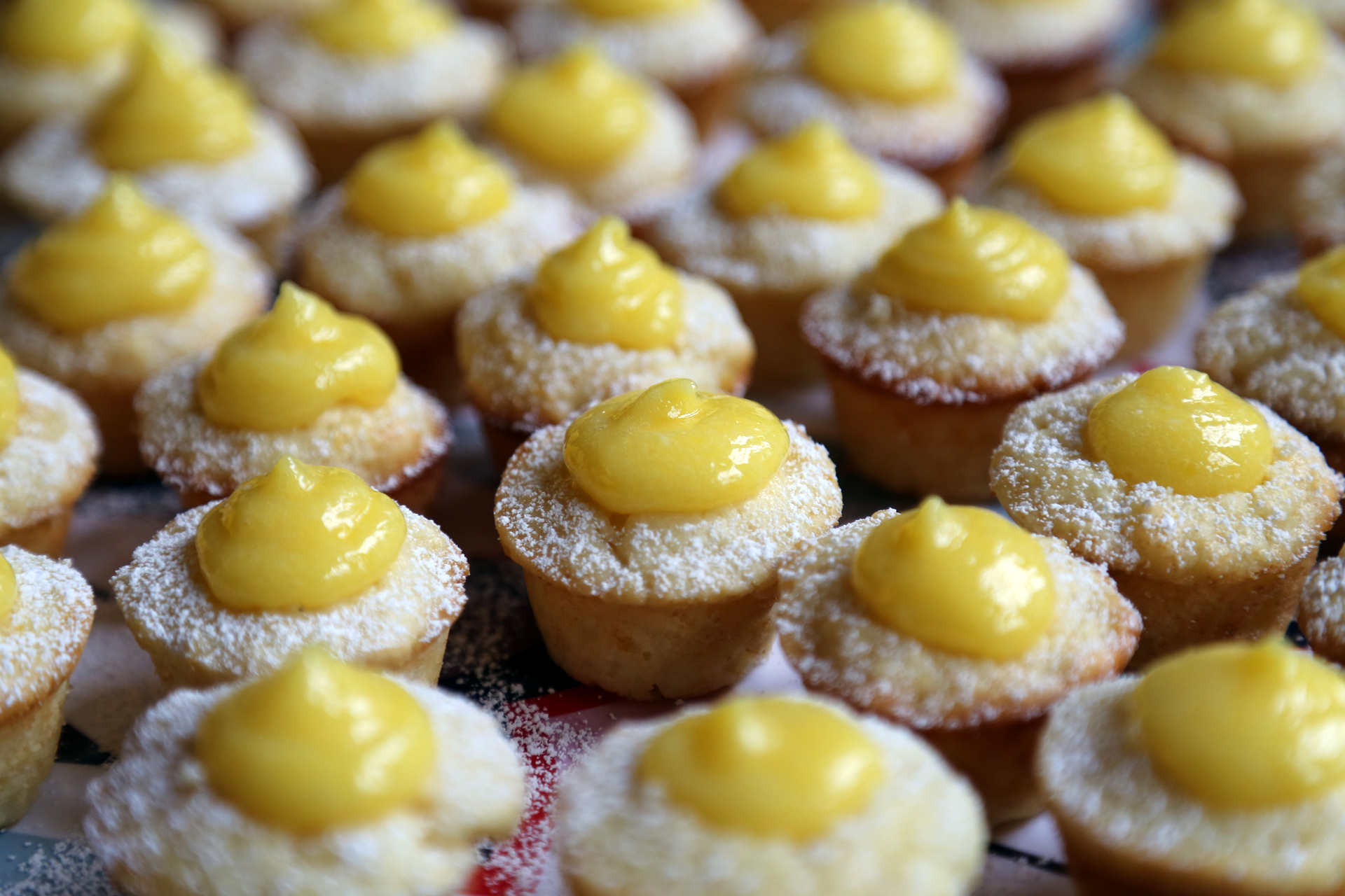 Serve the Mini Meyer Lemon Curd Cupcakes at once.
