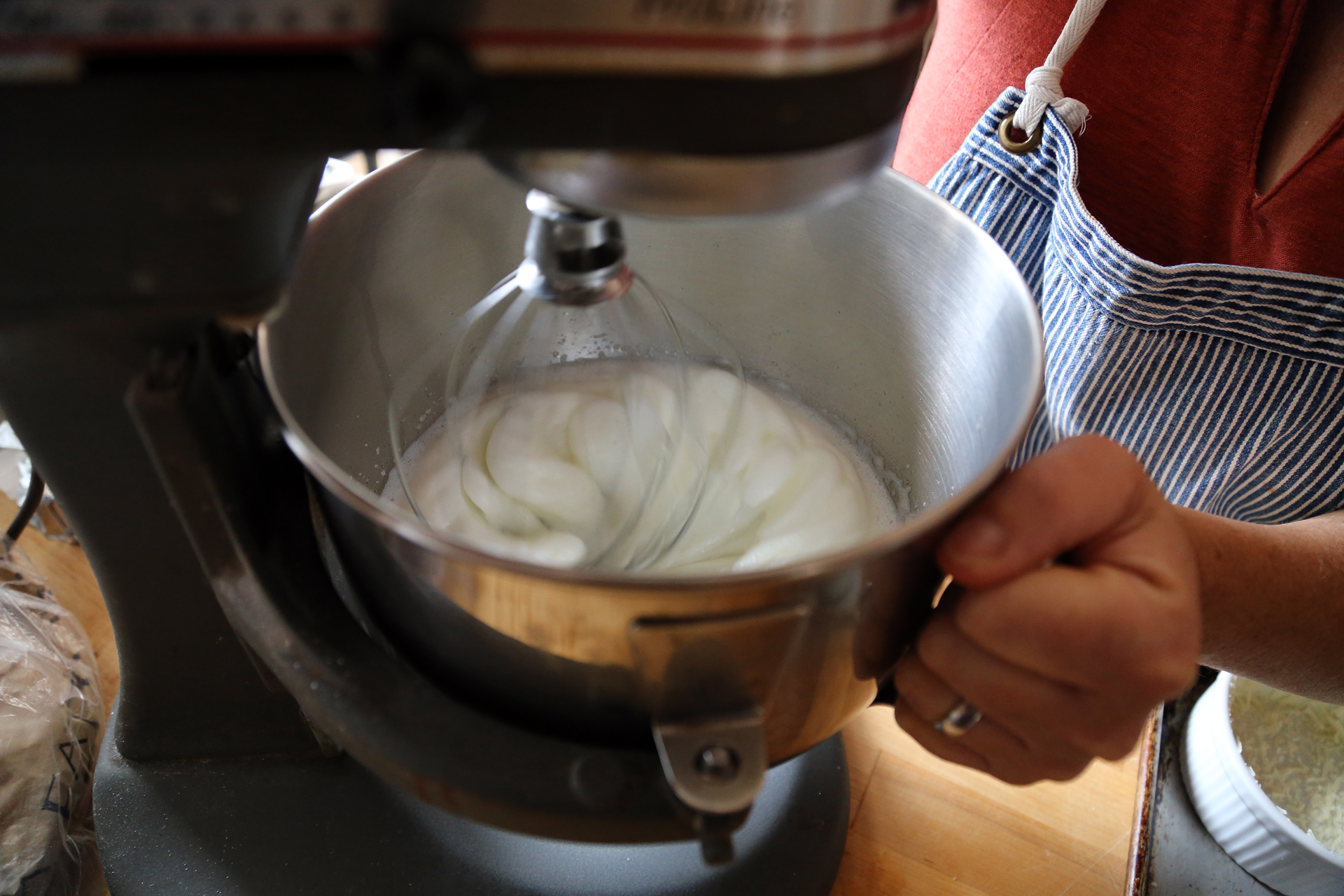 In a large bowl, using an electric mixer fitted with the whisk attachment, beat the egg whites and cream of tartar.