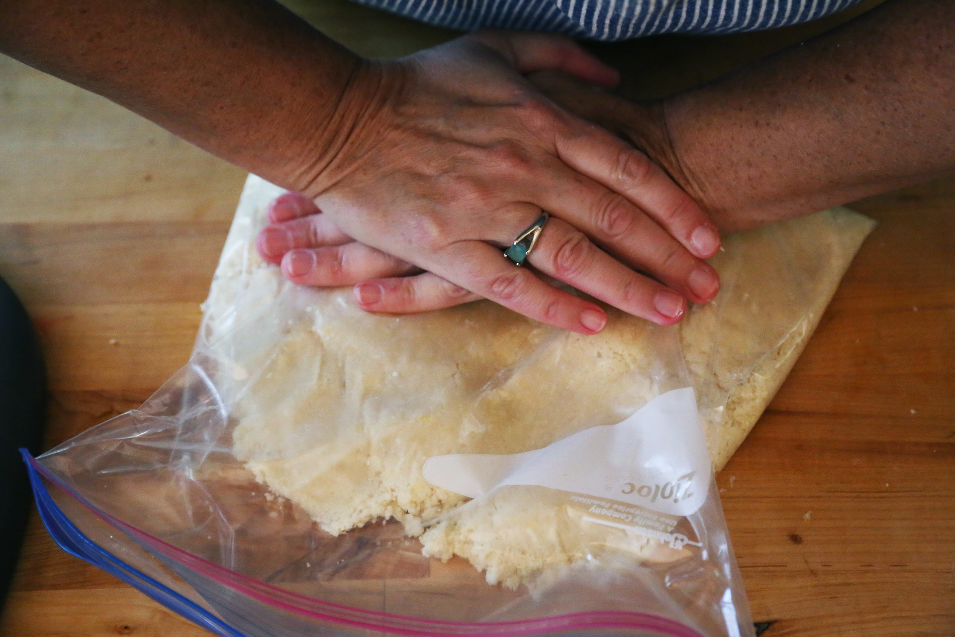 Transfer the dough to a large zippered plastic bag and press it together into a disk. Refrigerate for 30 minutes.