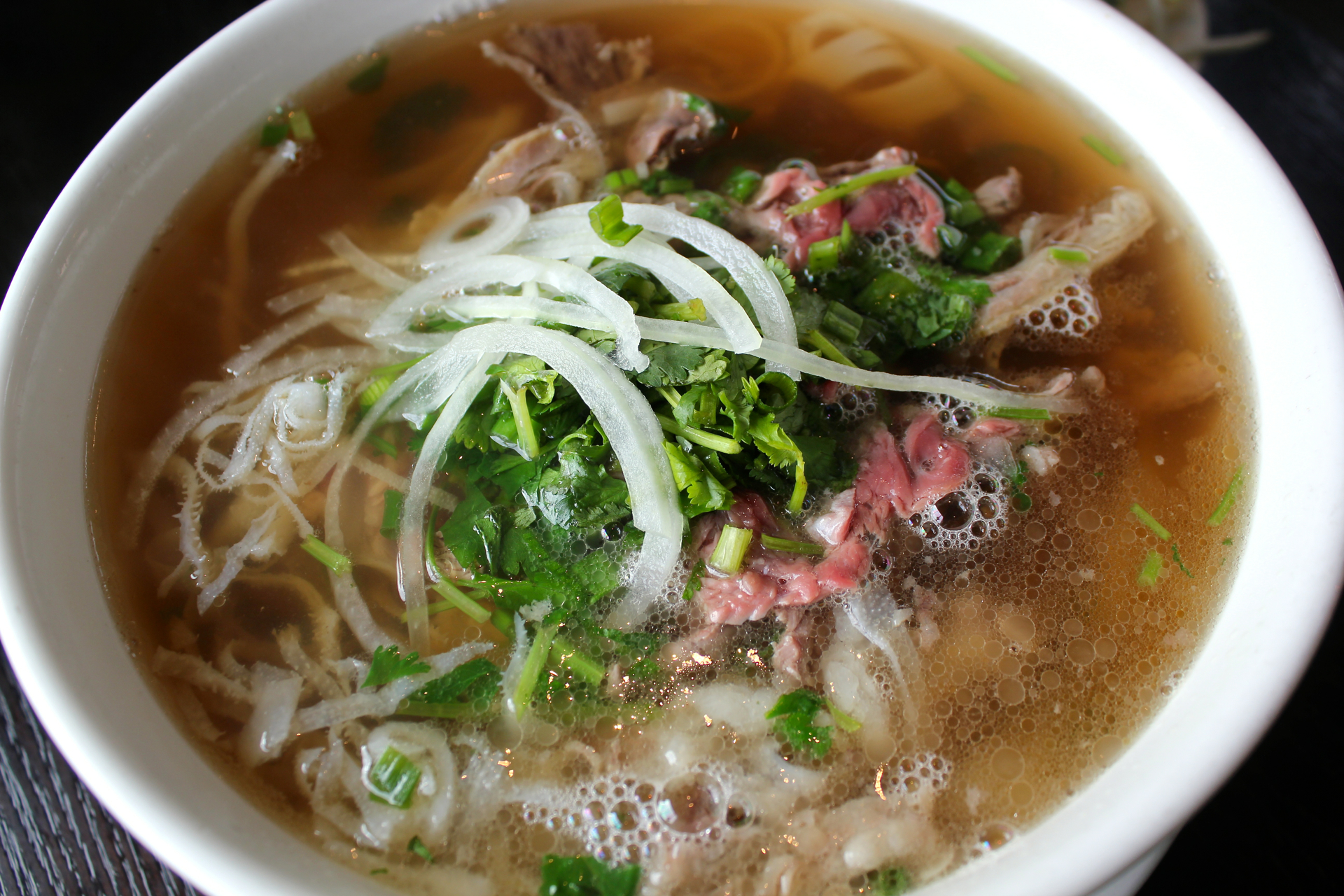 Pho dac biet at Pho Factory with rare filet mignon, well-done flank, brisket, tendon and tripe.