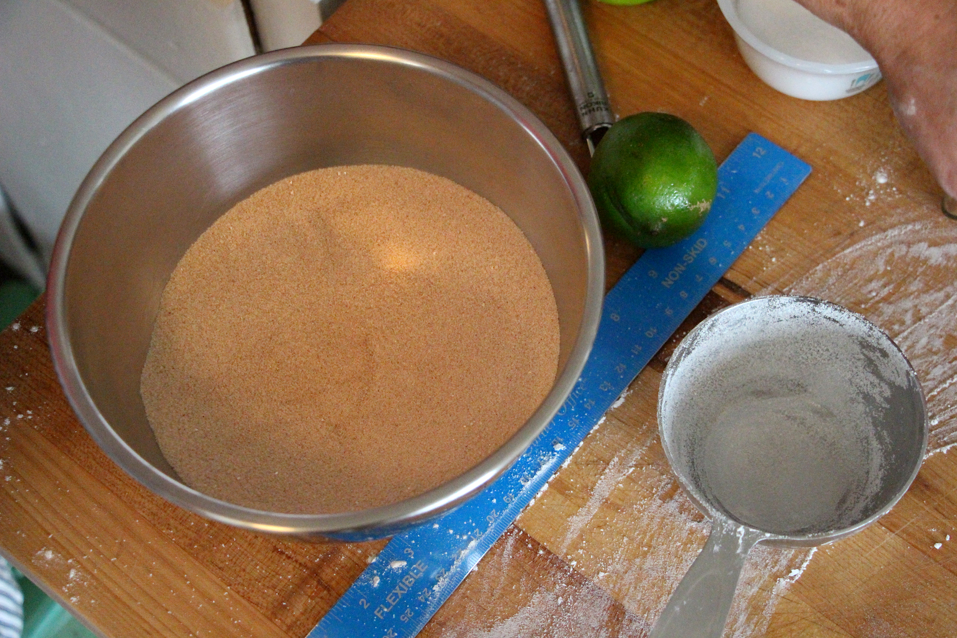 n a large bowl, whisk together the sugar and cinnamon. Set aside.