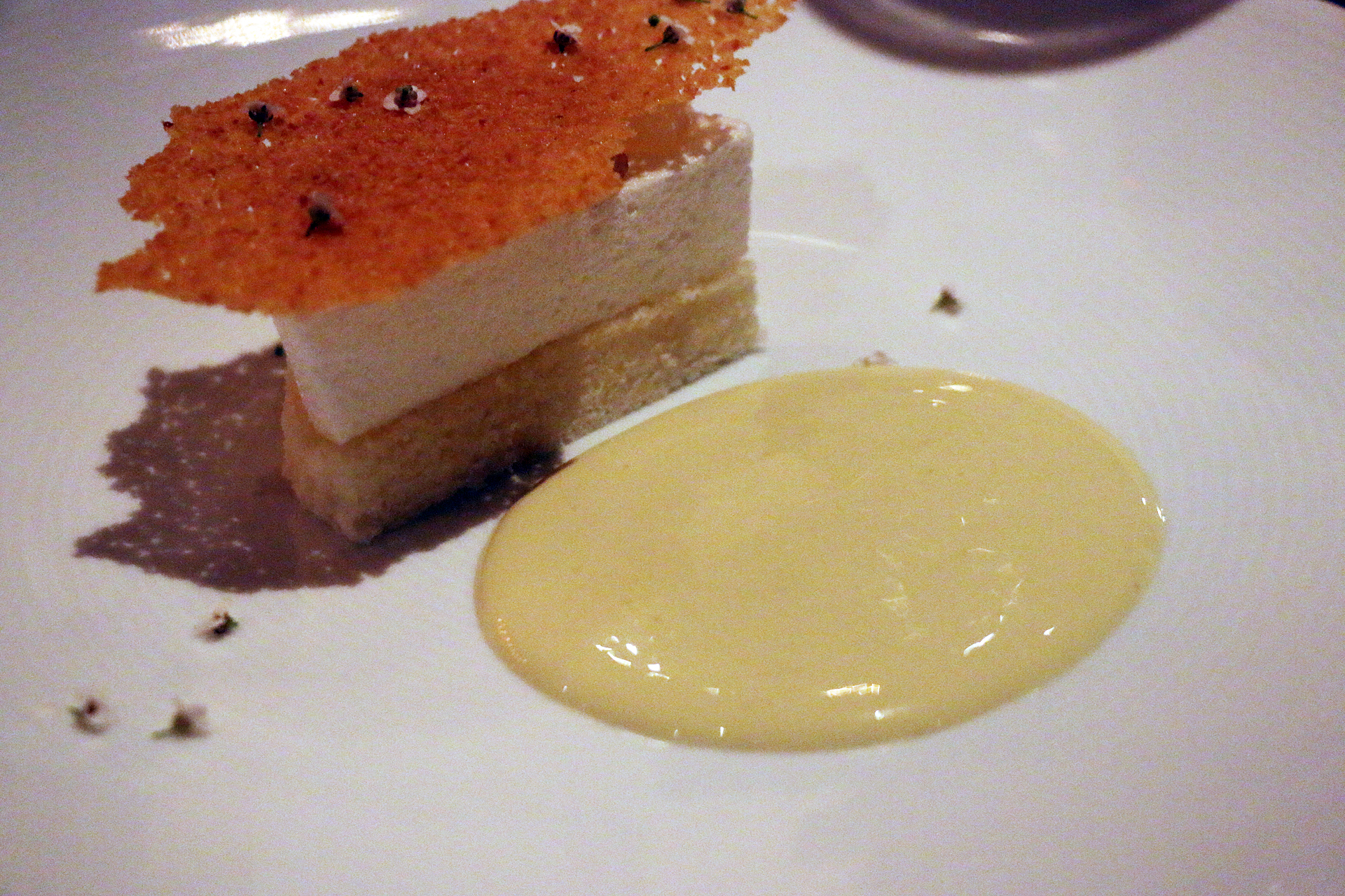 Soft-baked meringue, Meyer lemon cake and almond praline.