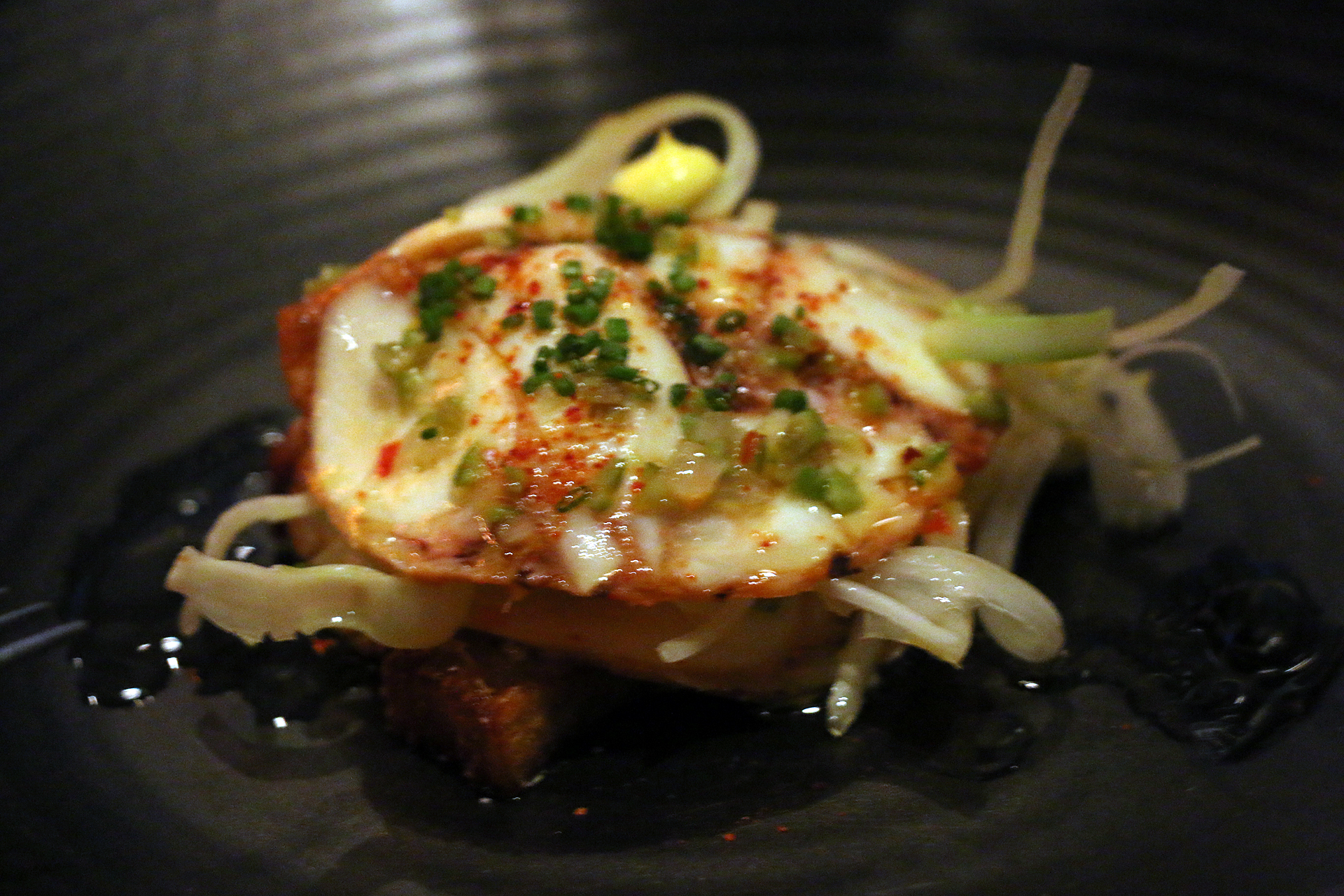 Octopus mille-feuille with pommes Anna, Castelvetrano olives and saffron aioli.