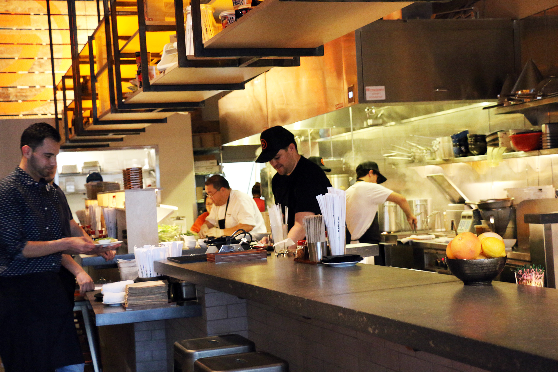 The fast-paced open kitchen at Itani Ramen.