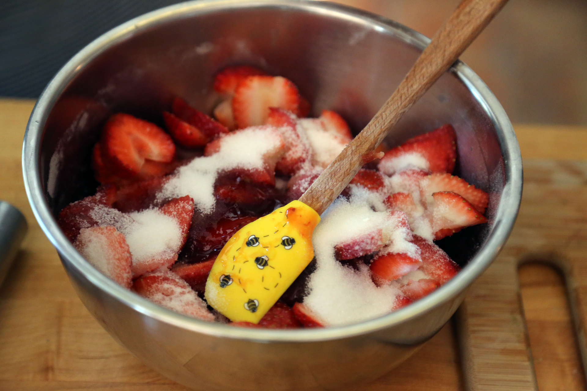 To prepare the strawberries, toss together the strawberries, sugar, jam, lemon juice, and flour.