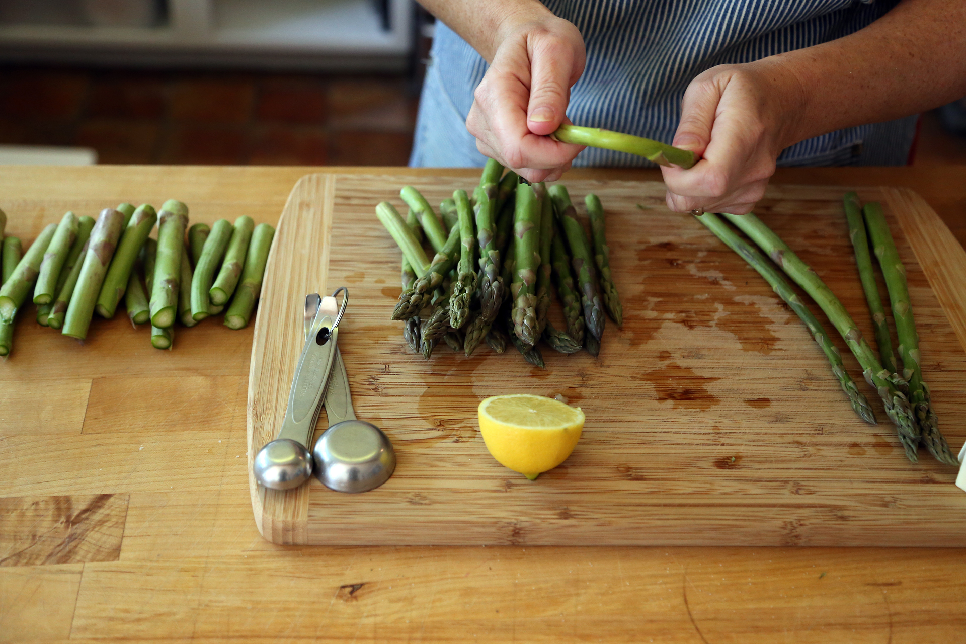 Snap off the tough ends of the asparagus before roasting.