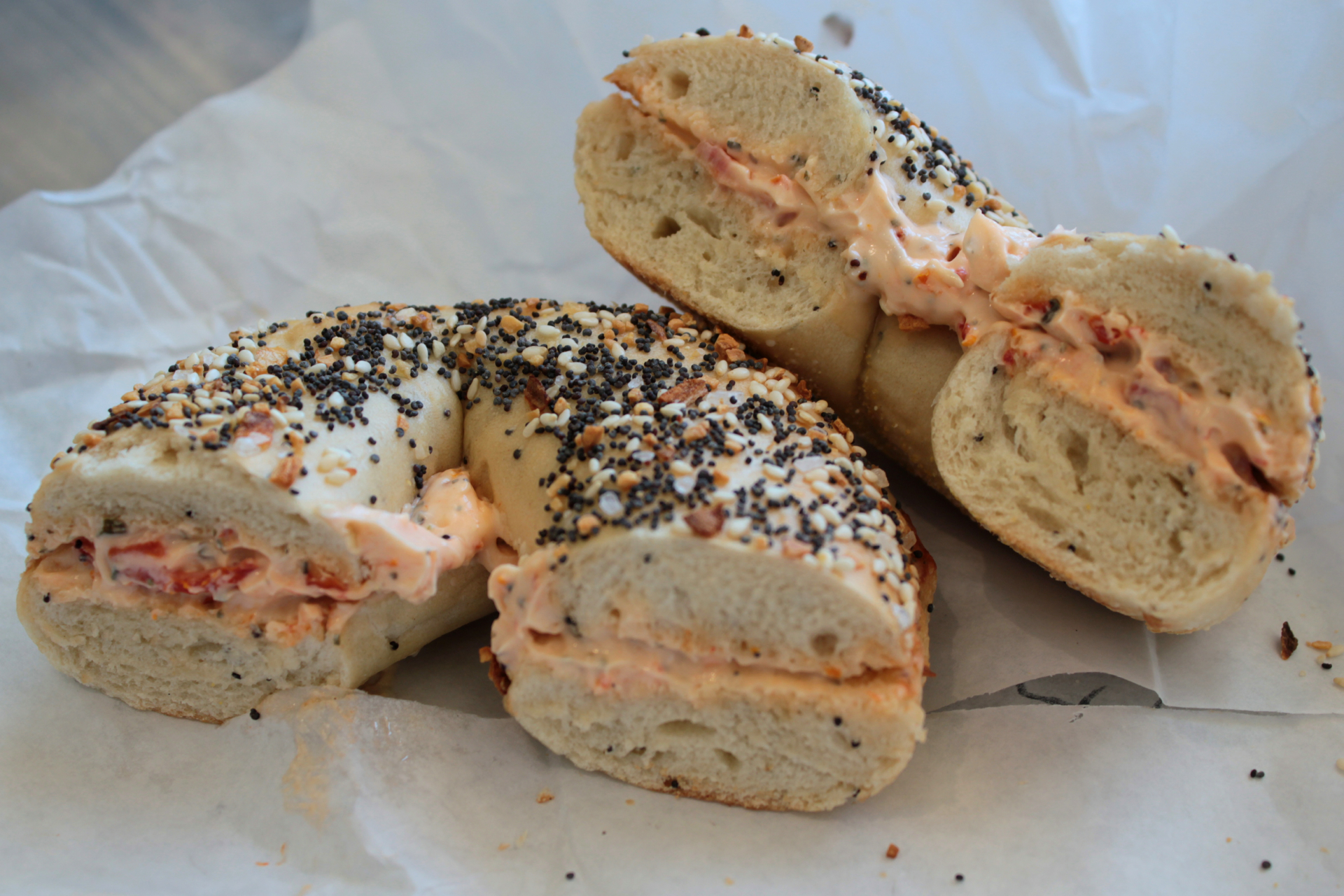 An everything bagel with sun-dried tomato cream cheese.