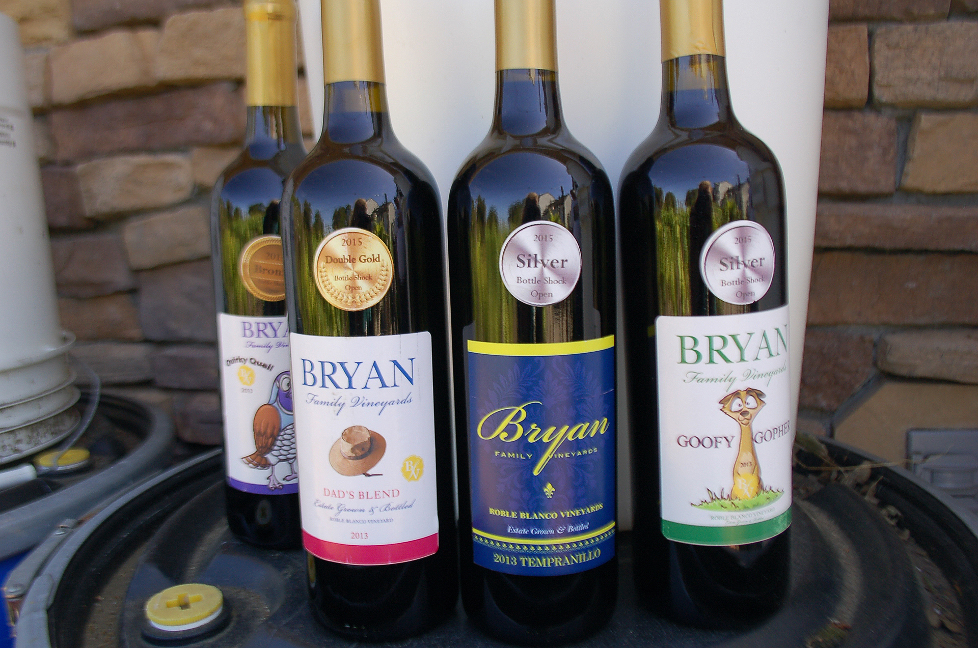 Scott Bryan's serious winemaking hobby has earned him medals at home winemaking competitions. His wines have humorous names like Goofy Gopher, Quirky Quail and Dad's Blend.