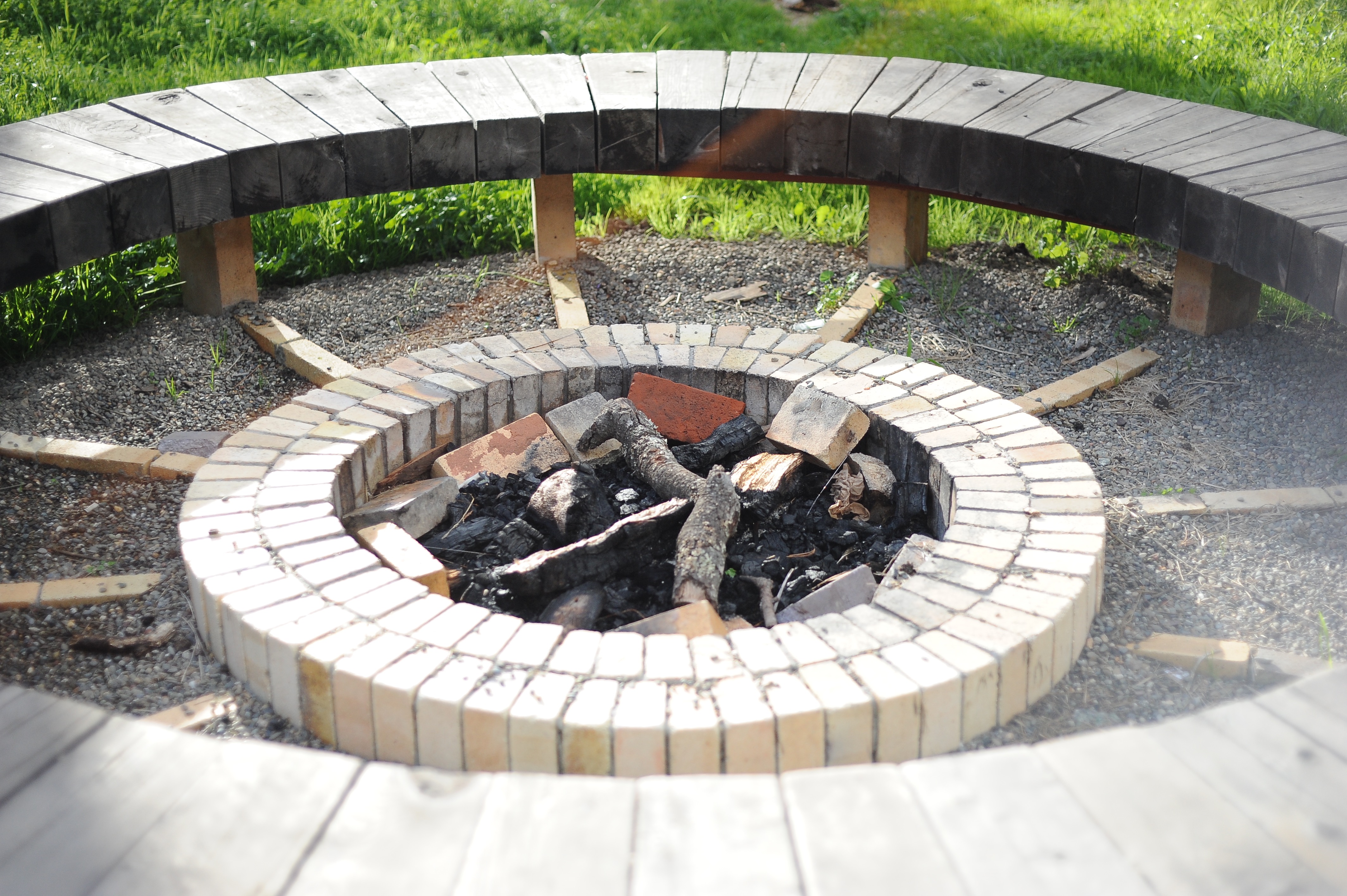 The bench that encircles Pie Ranch’s communal fire pit is inscribed with this wish, “May this fire warm all those who have come before us and all who now love and nourish this land.” 