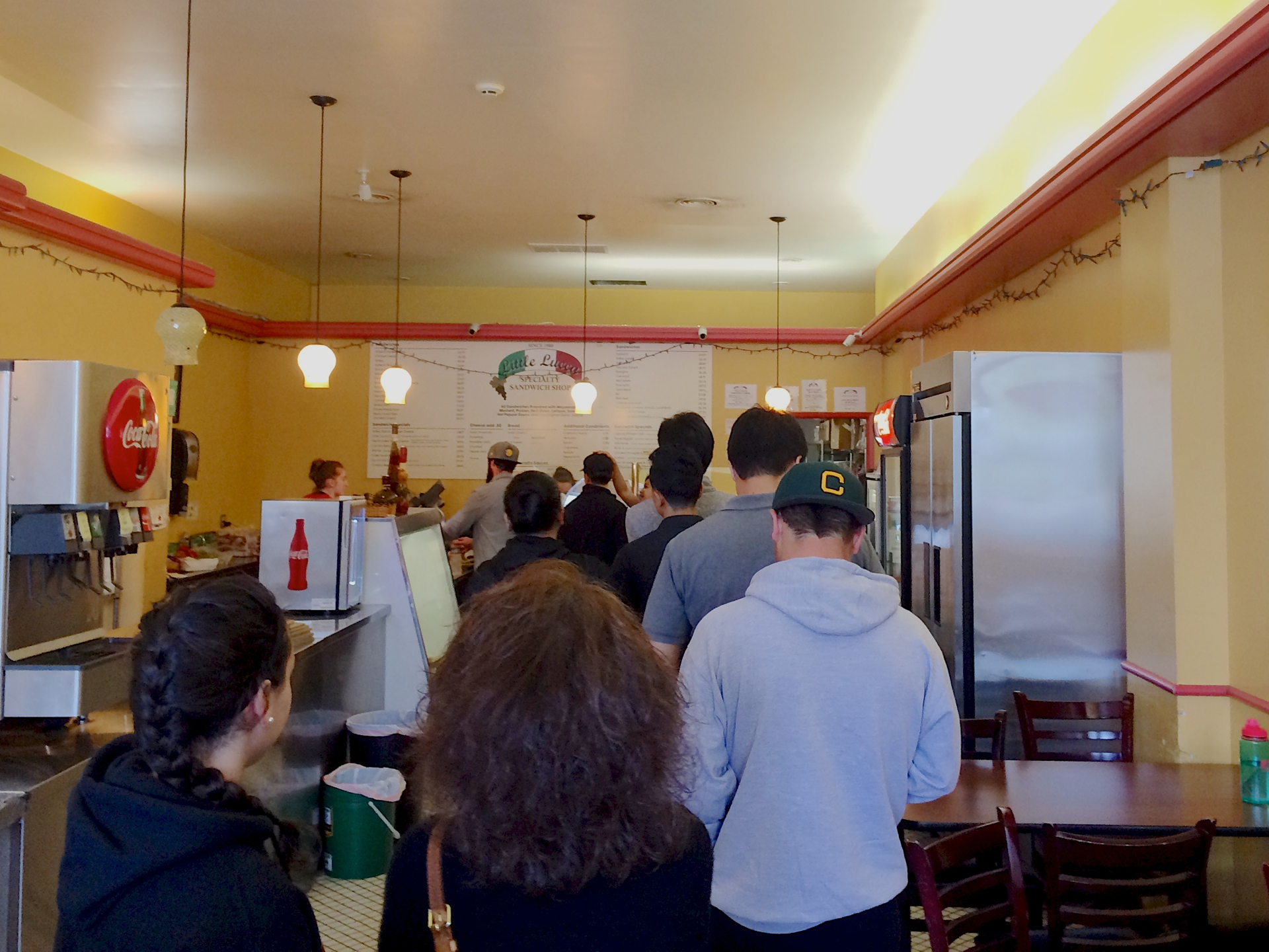 Customers waiting to order at Little Lucca in Burlingame.