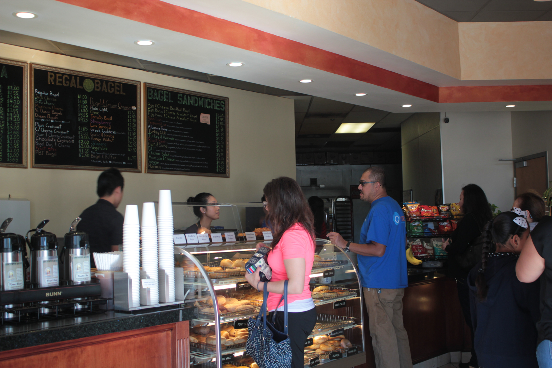 Customers ordering at Regal Bagel in San Jose. 
