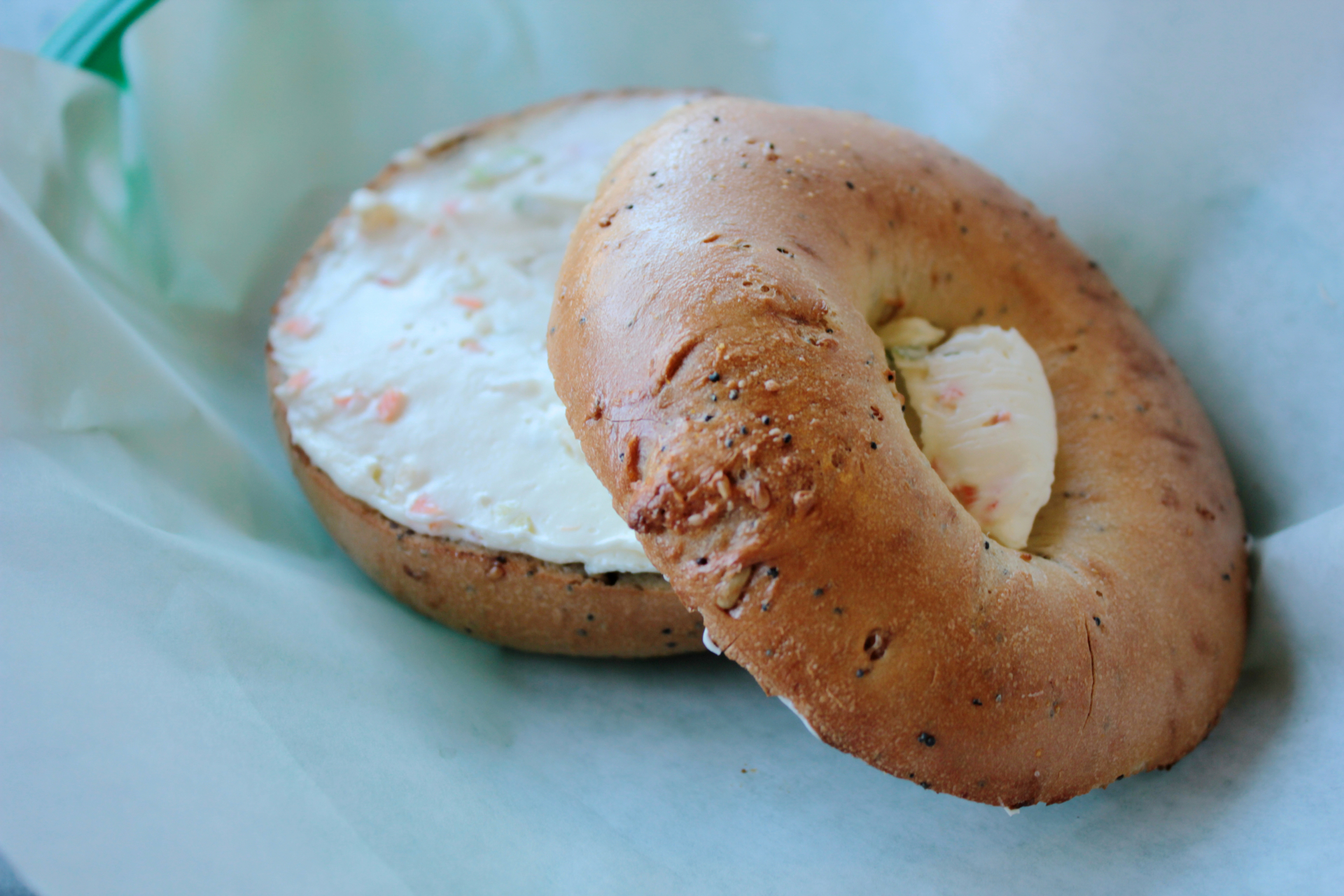 A tri-seed bagel with garden vegetable cream cheese at Saratoga Bagels.