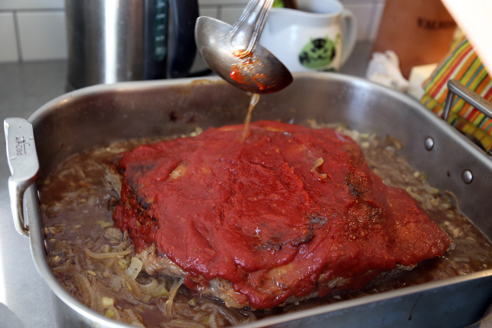 Transfer to the middle rack of the oven and braise, basting about once an hour.