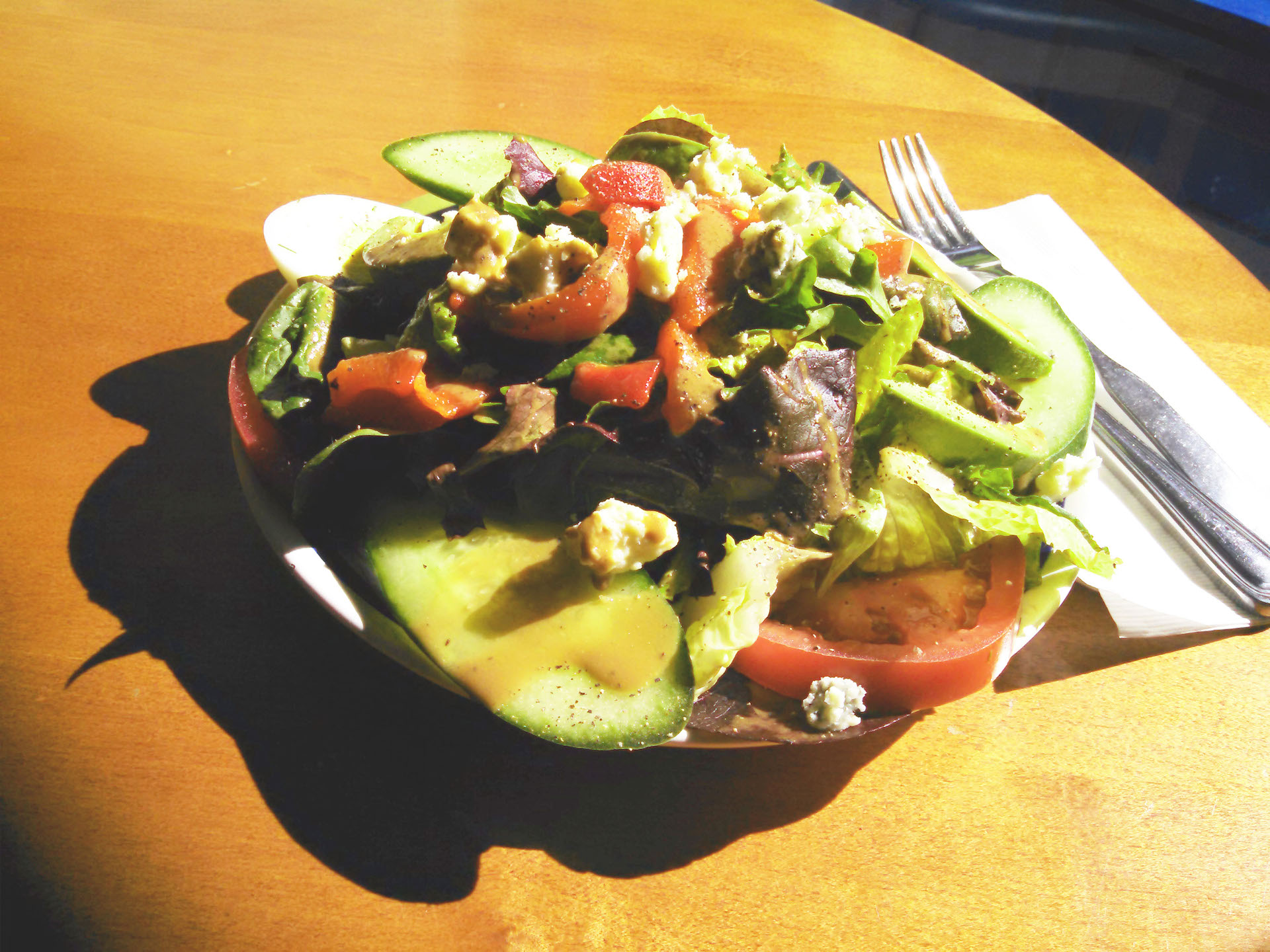 The Maison salad in the setting sunlight