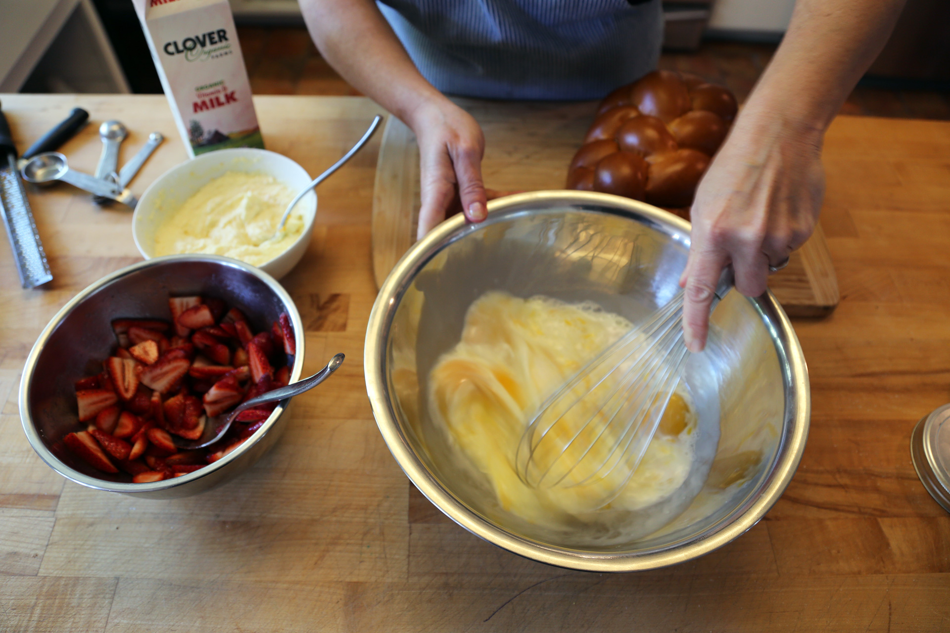 In a large shallow bowl, whisk together the eggs, milk, vanilla extract, and a pinch of salt.