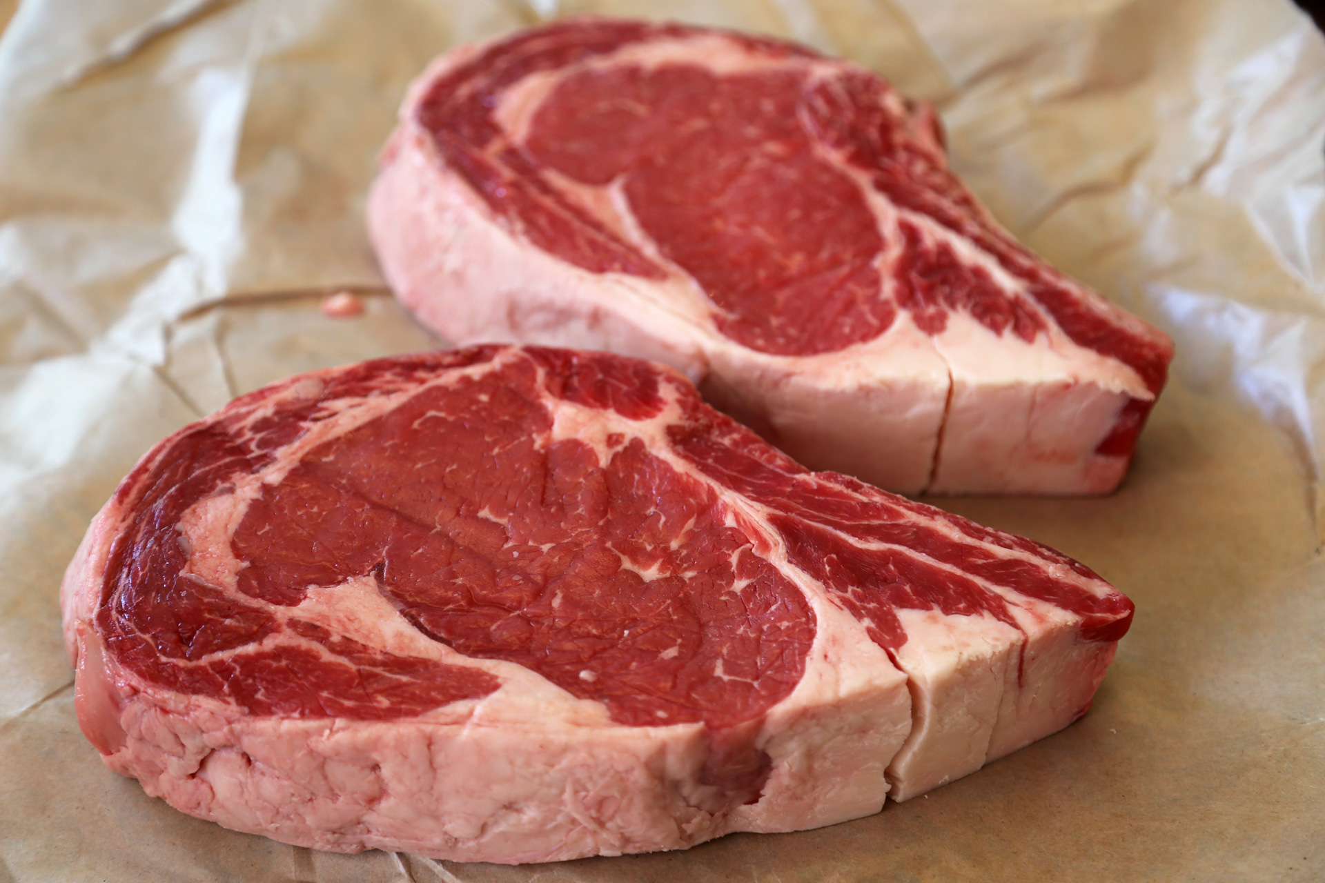 Your steak should be 1-1/2 inches thick. well-marbled and bone-in.