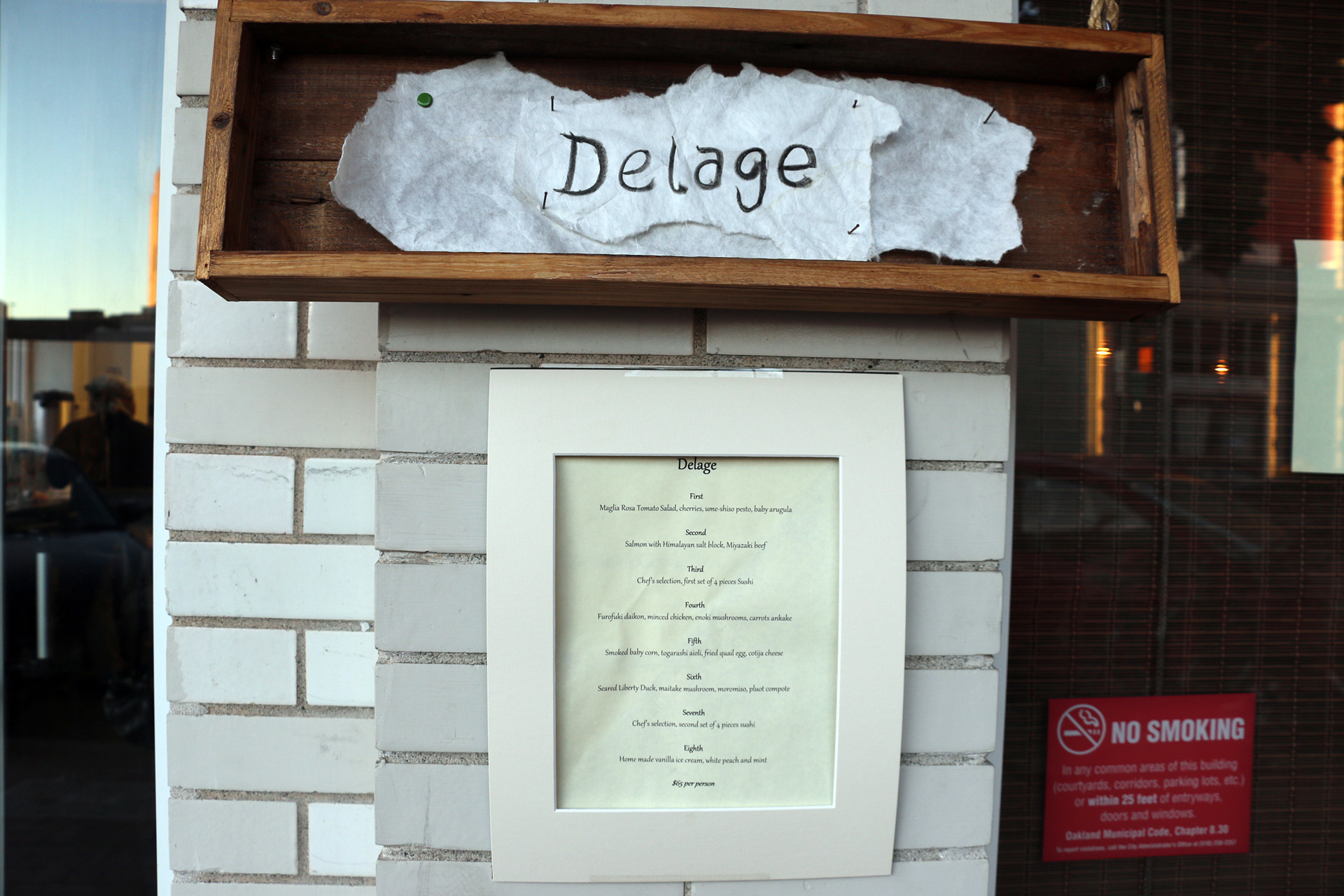 The nightly menu on display outside Delage.