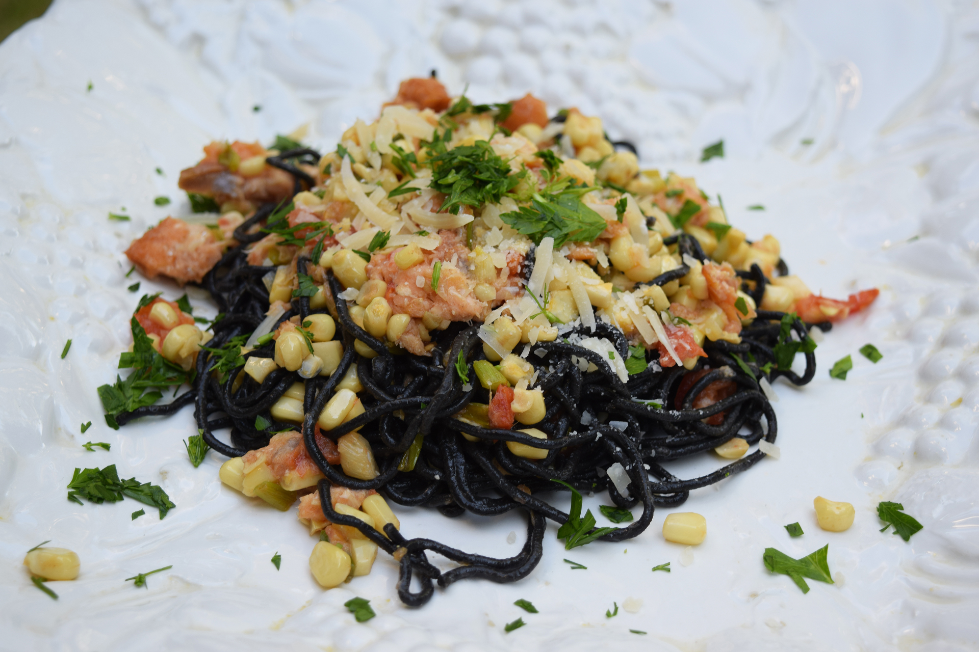 With its faint seashore flavors, the squid ink linguine from Pasta Pasta is great paired with seafood, such as this mélange of corn, tomato, smoked salmon and herbs.