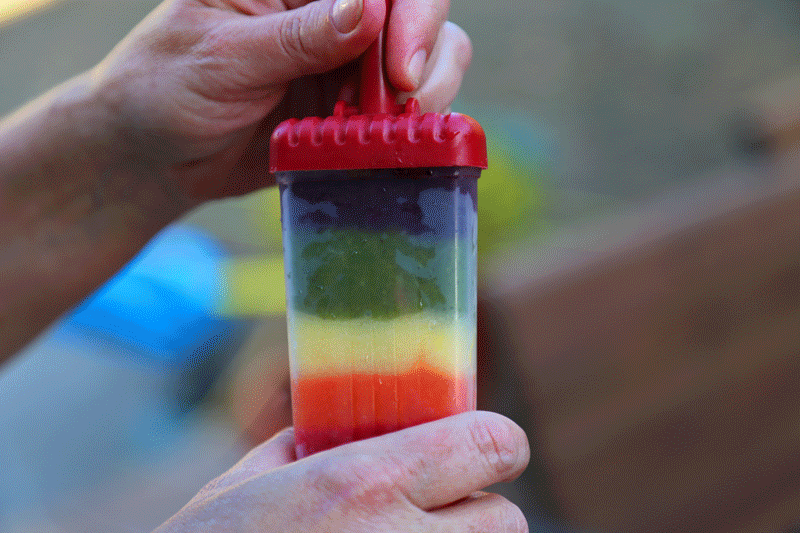 Unmolding Fruity Rainbow Popsicles for Pride