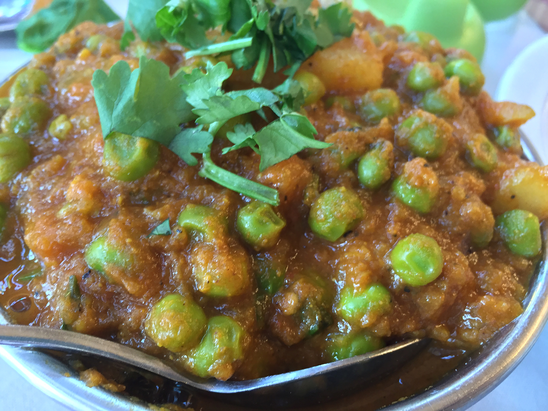 Aloo matar, a sweetly spicy combination of peas and potatoes.