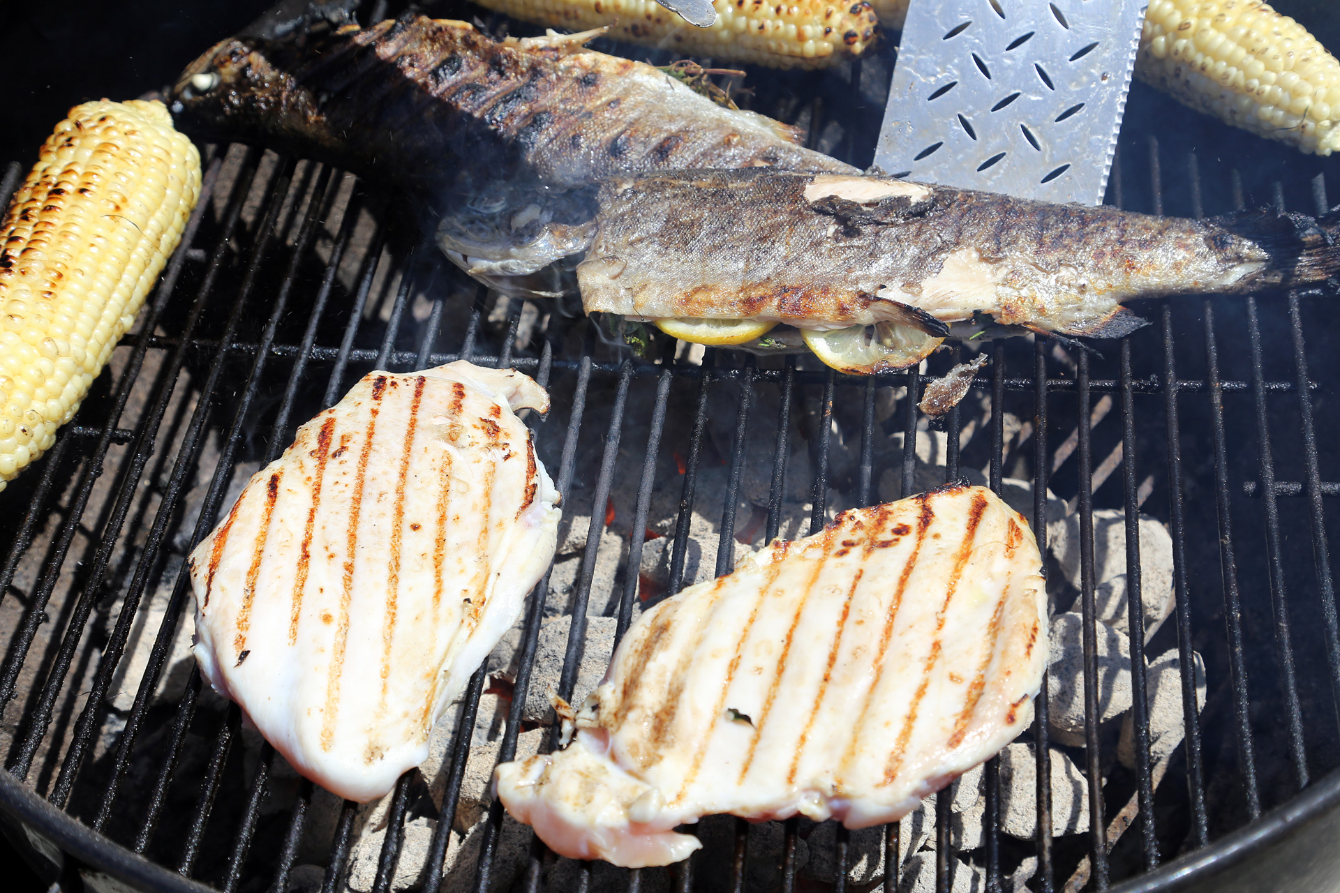 Grill over the fire until nicely seared on both sides, turning occasionally, about 2 minutes on each side.