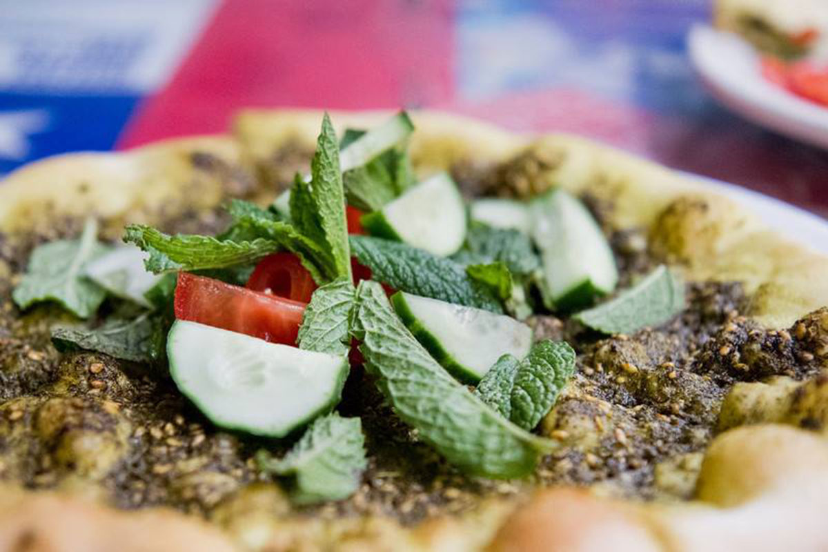 Reem's mana’eesh topped with za’atar (a savory paste of thyme, sumac berry, sesame seed, olive oil, and salt)
