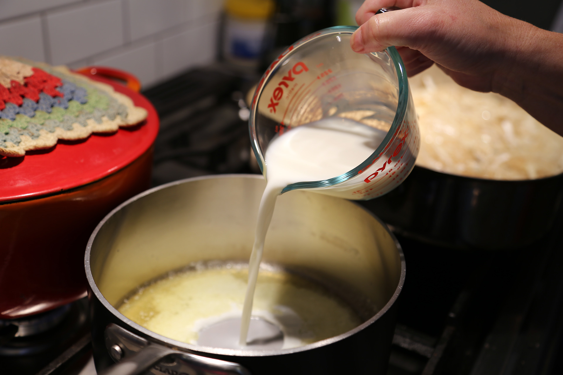In a small saucepan over medium heat, melt the butter. Add the milk, water, and honey and heat until just warm.