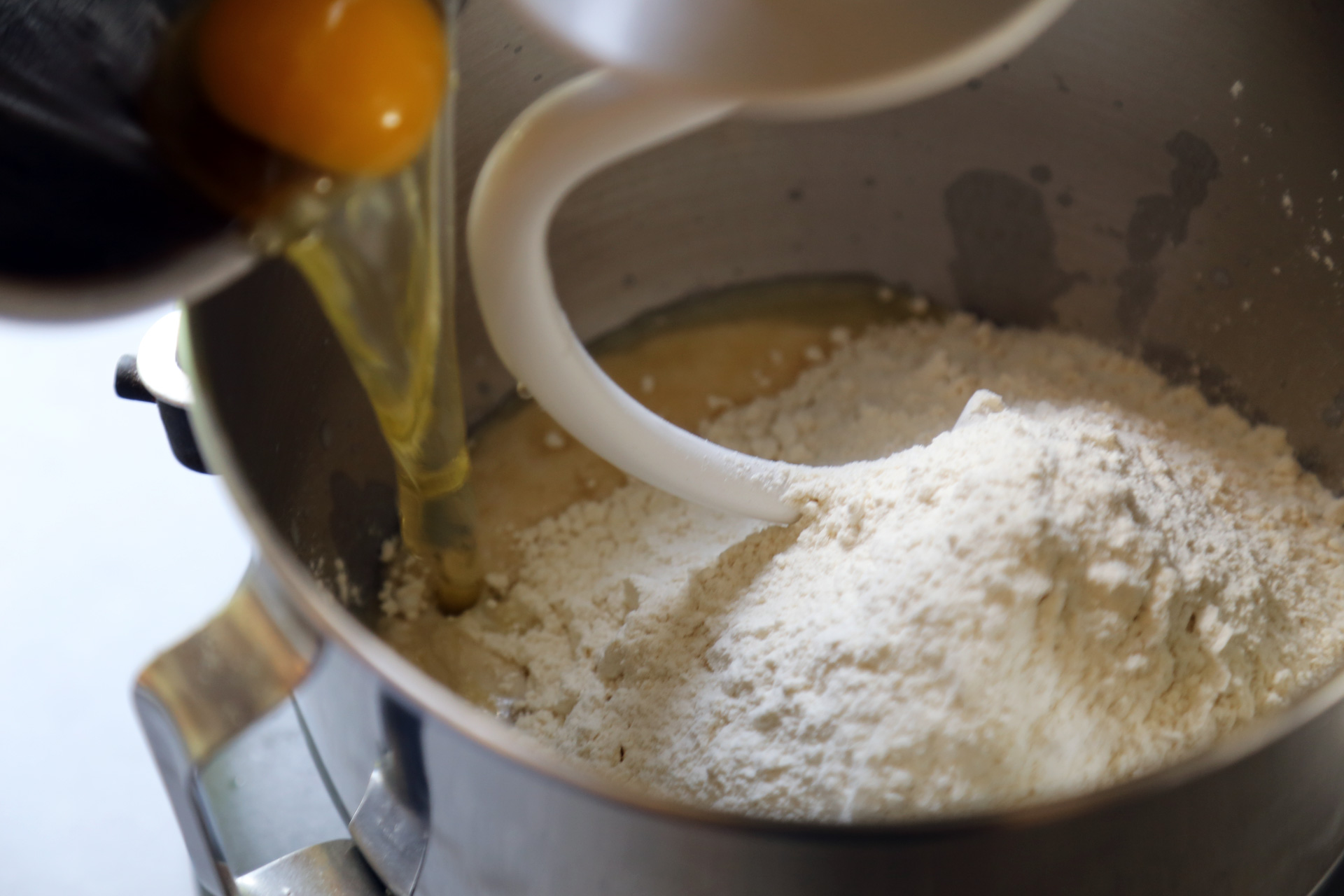 Fit the stand mixer with the dough hook, then add the 2 eggs, the flour, and the salt.