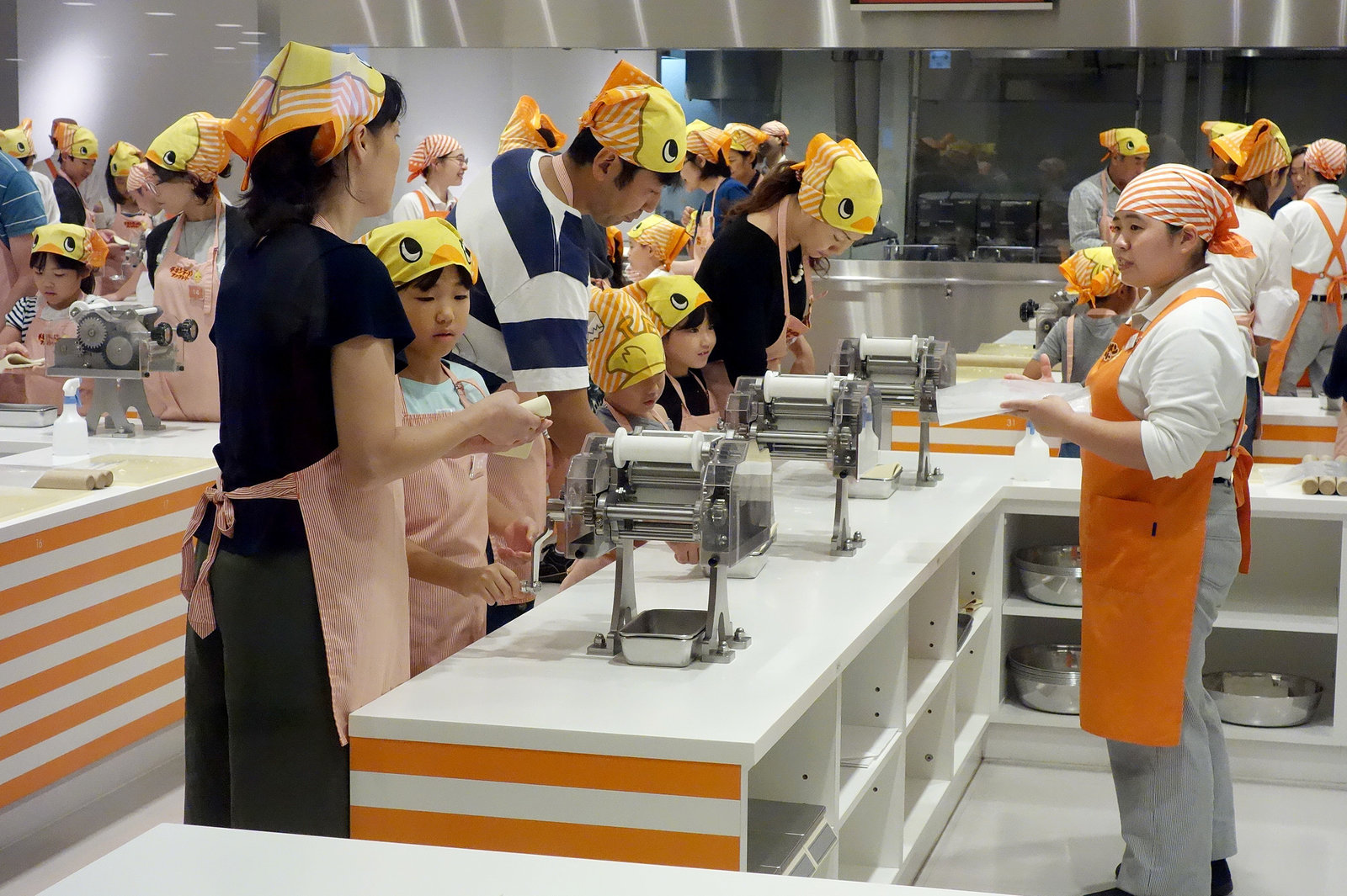 Visitors make their own noodles in the museum's working kitchen.