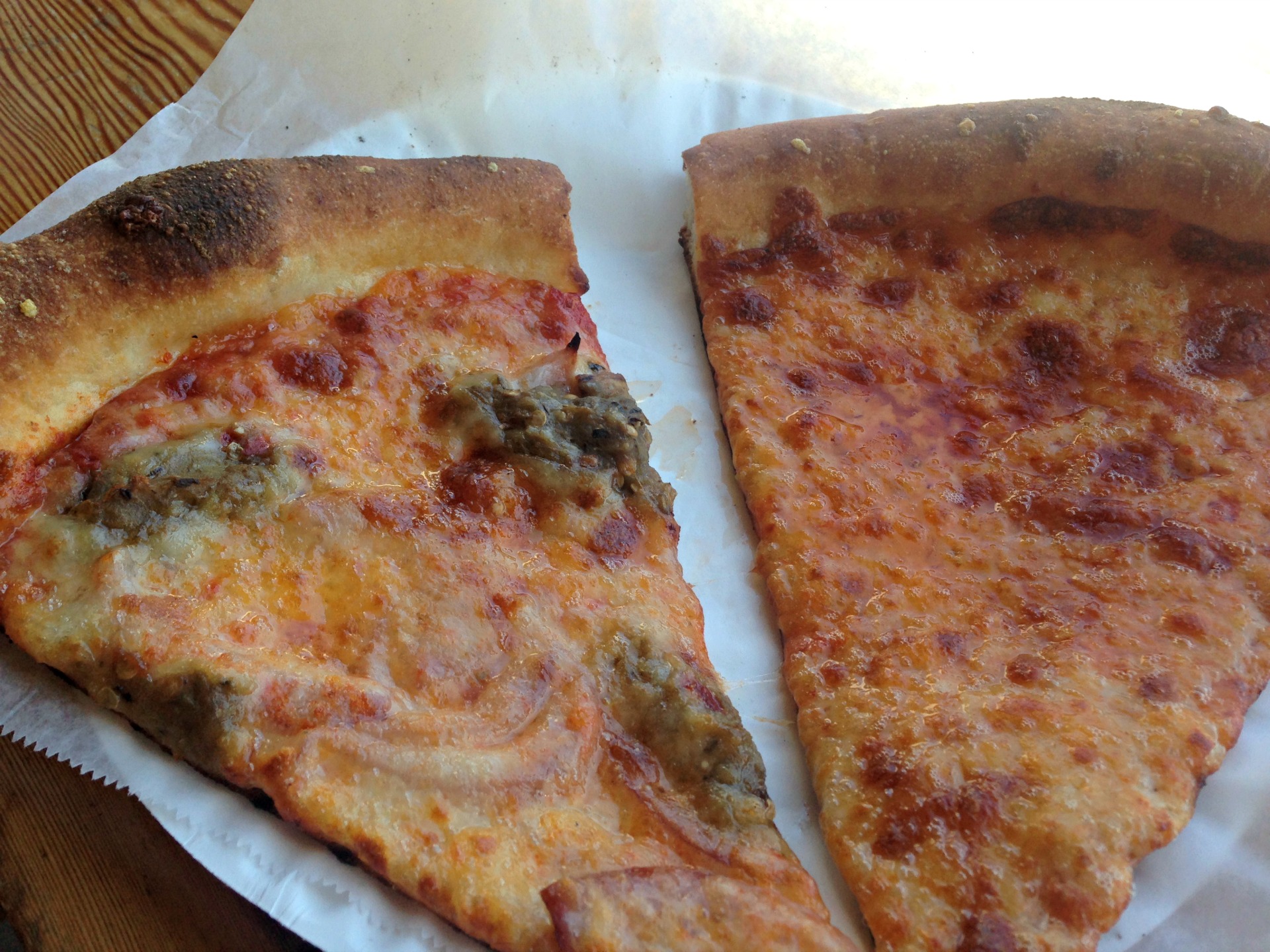 A slice of eggplant and mint and a slice of cheese from Oakland's Slicer.