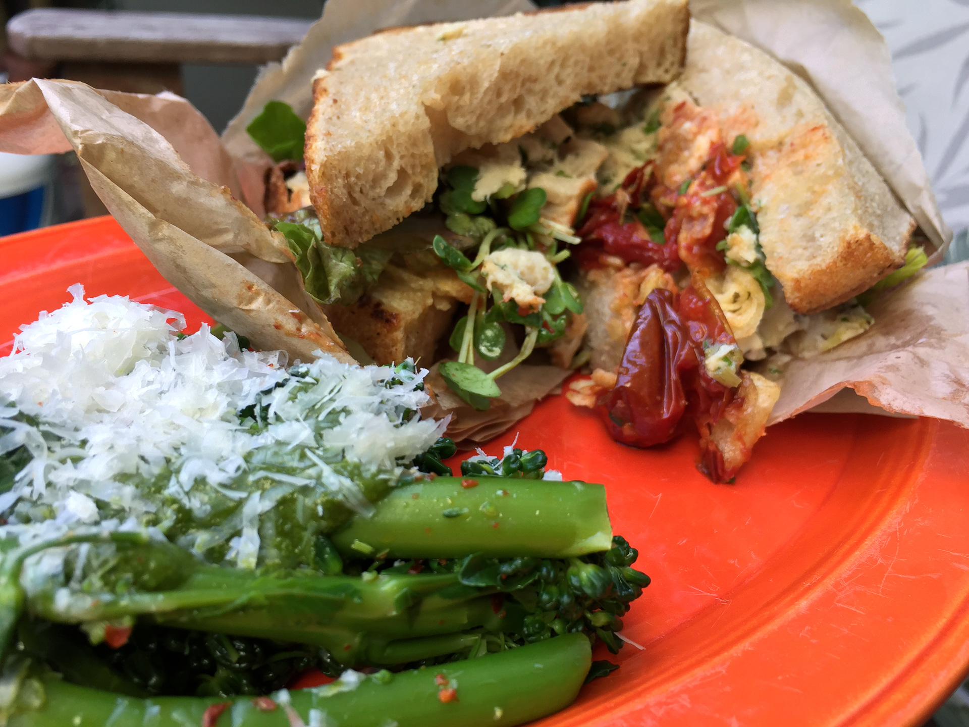 Poached local albacore sandwich on Josey Baker bread with a side of broccoli rabe with chermoula dressing