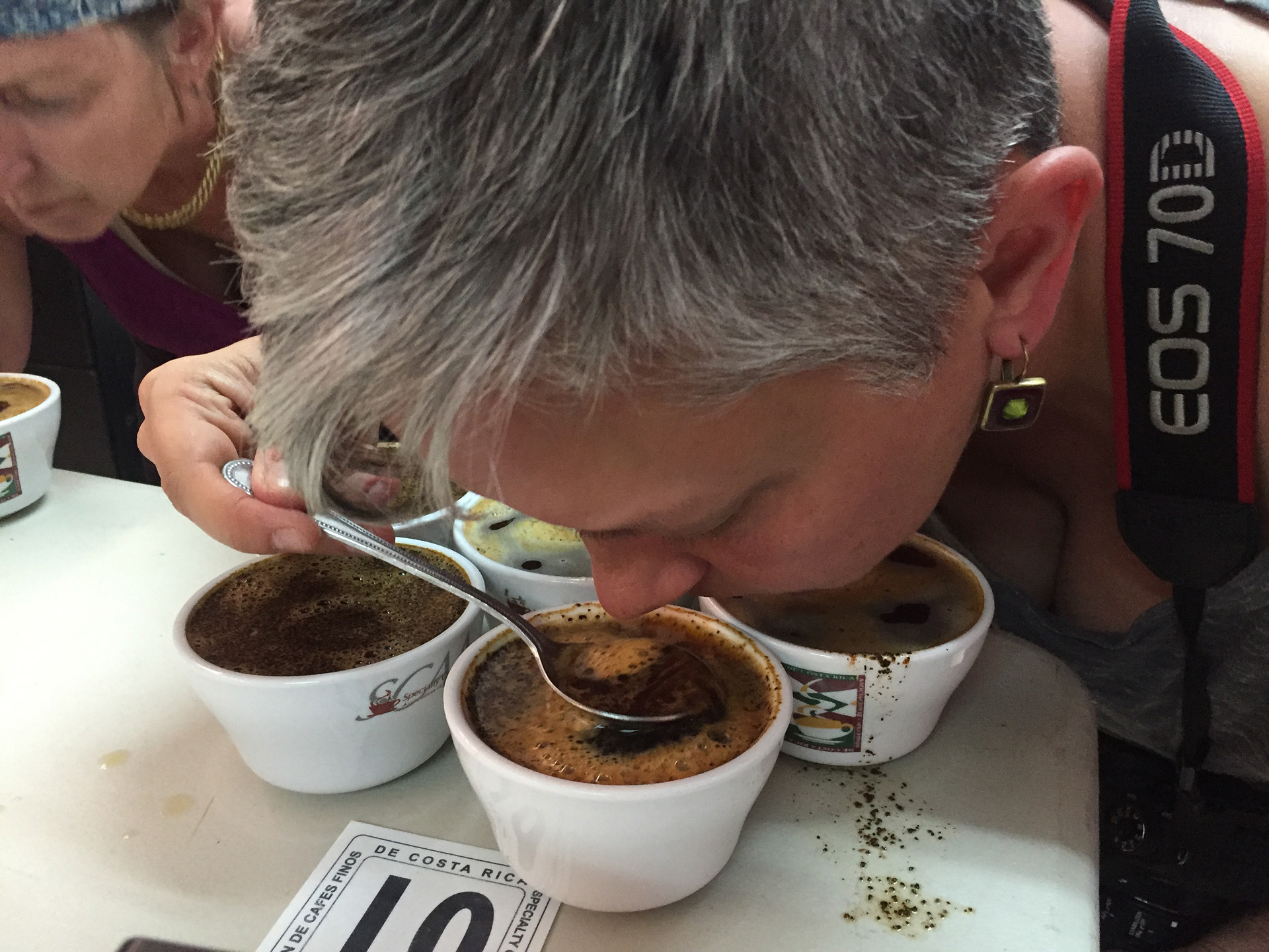 The author, Kim Westerman, cupping coffee in Costa Rica