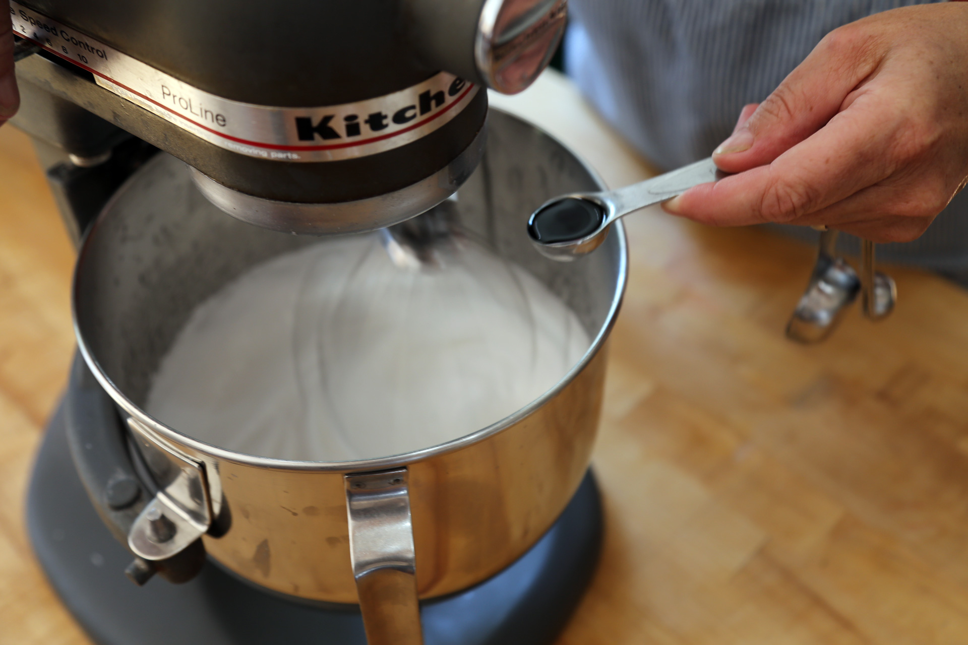 Turn the mixer up to medium-high and whip the mixture until it lightens and thickens, about 5 minutes. Add the vanilla.