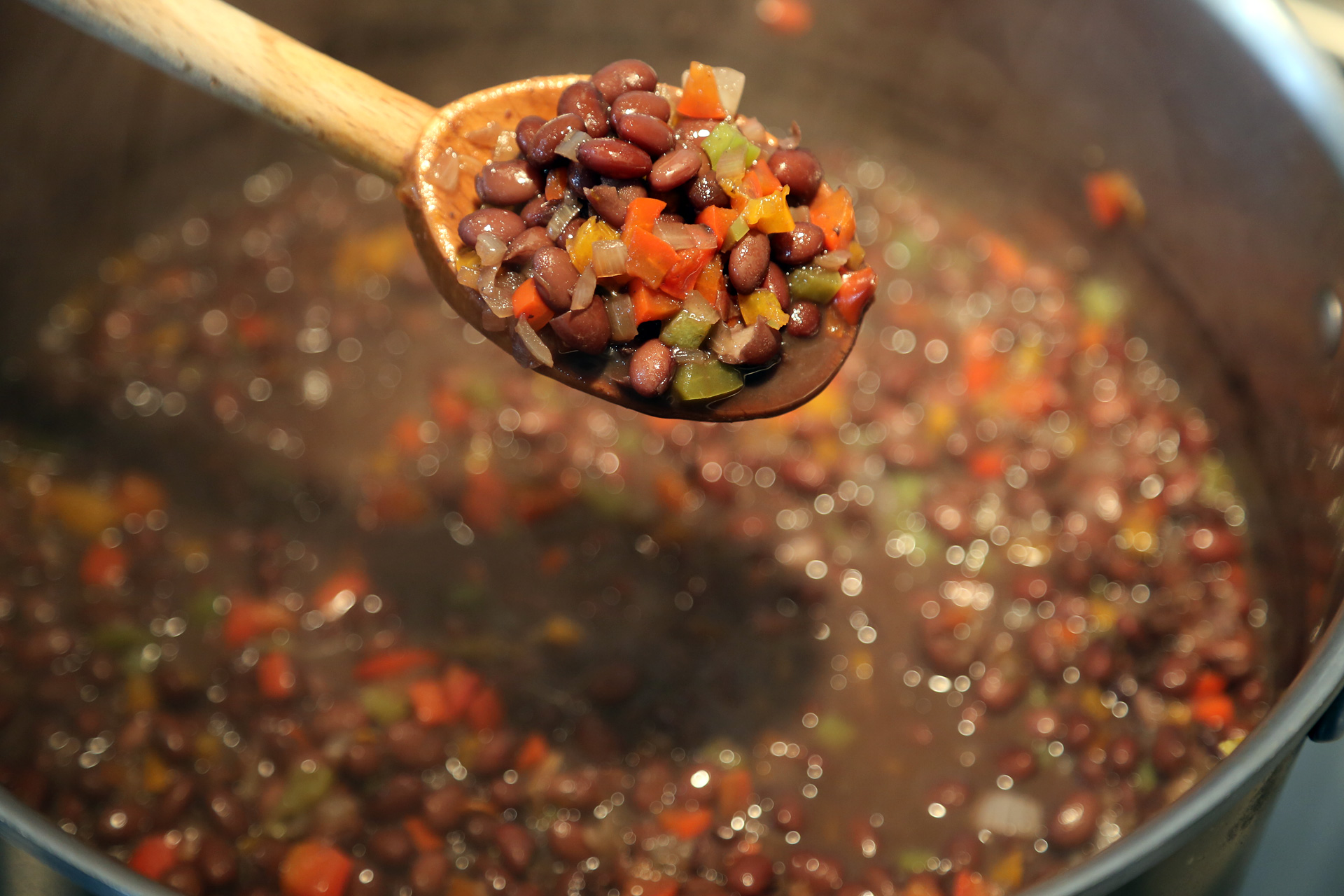 Let simmer for 15 minutes longer, then taste and adjust the seasonings with salt, pepper, sugar, and hot sauce.