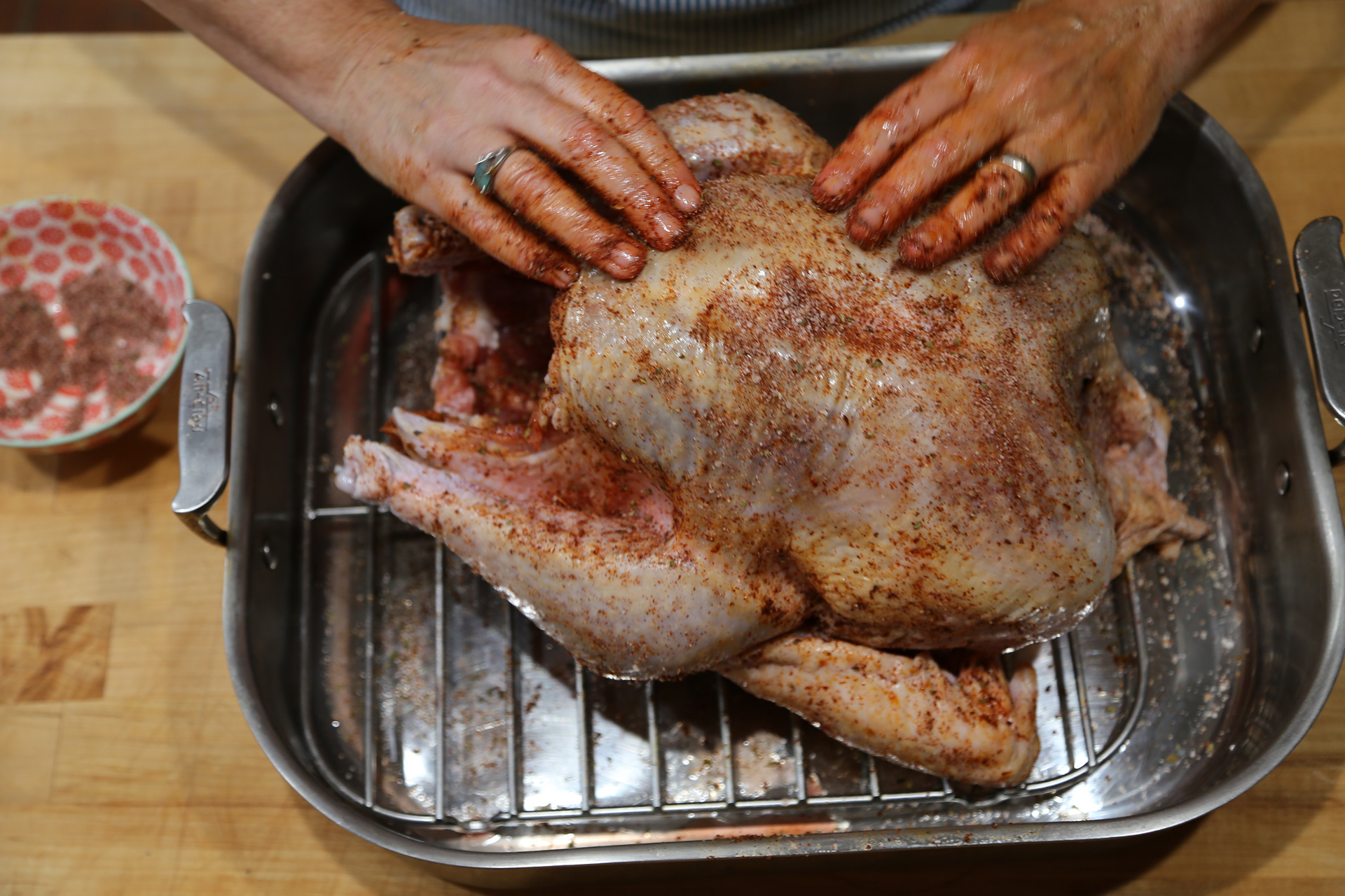 Rub the salt mixture all over the turkey, under and over the skin and in the cavities. 