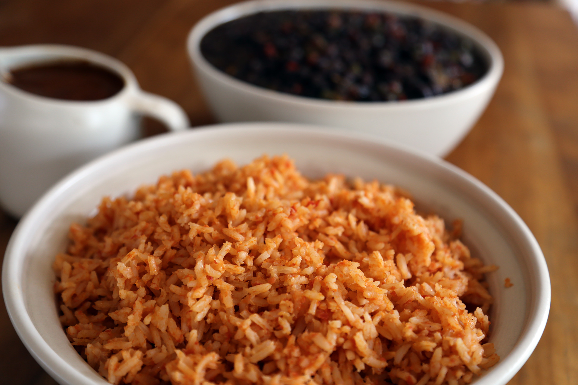 Fluff the rice with a fork, then serve with Savory Black Beans and Mole Gravy. 
