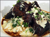 Red Wine Braised Angus Short Ribs over Three Cheese Risotto