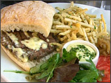 Hamburger on a French Roll with Aïoli and French Fries