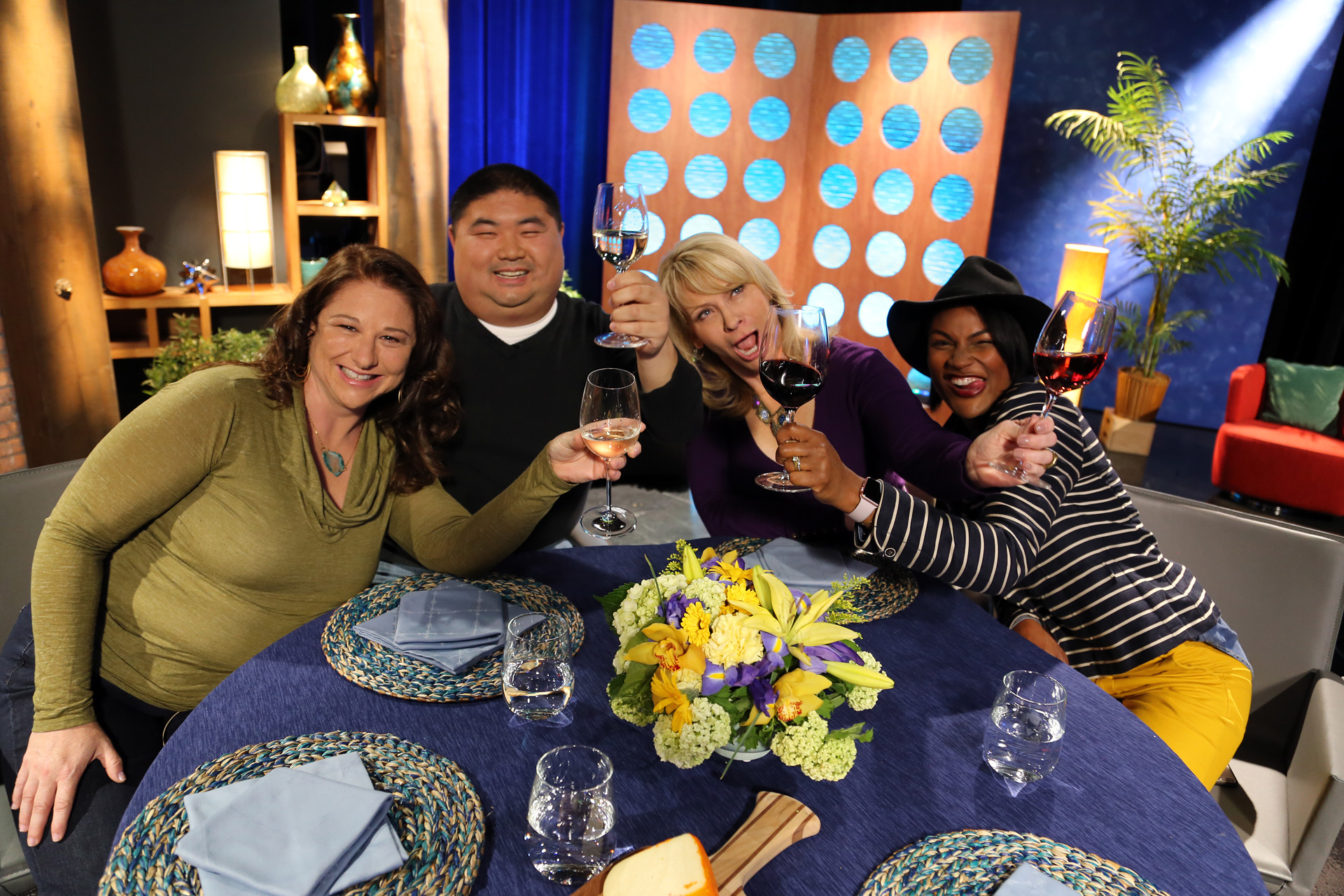 Host Leslie Sbrocco and guests having fun on the set of the episode 15 of season 11.