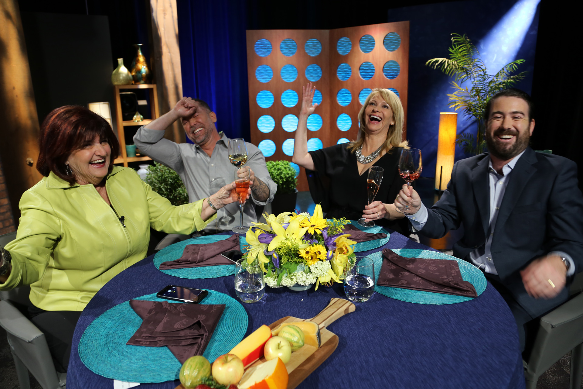 Host Leslie Sbrocco and guests having fun on the set of the episode 16 of season 11.