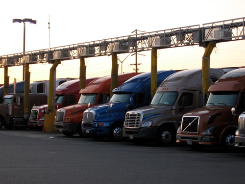 Trucks line up at an IdleAire terminal, which provides "carbon offsets" for airlines. Photo: Rori Gallagher