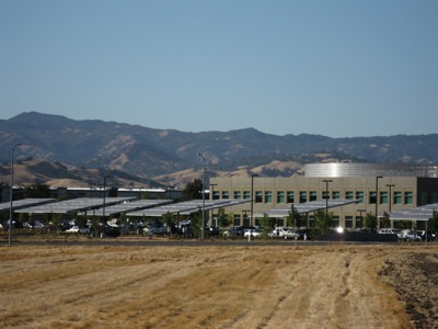 Solar panels shade the parking lot at Genentech in Vacaville.
