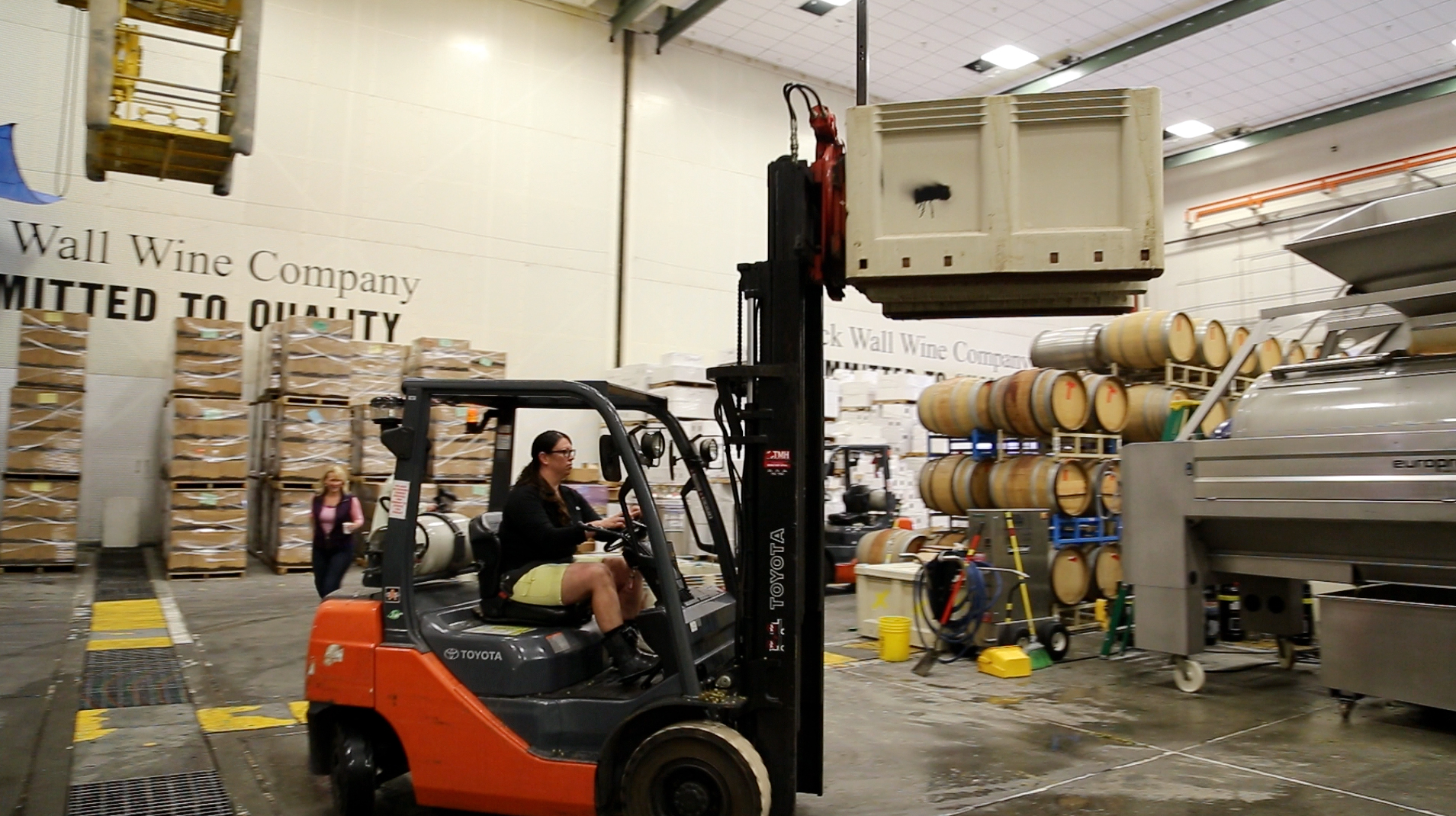 Winemaker Shauna Rosenblum crushes grapes at Rock Wall Wine Company