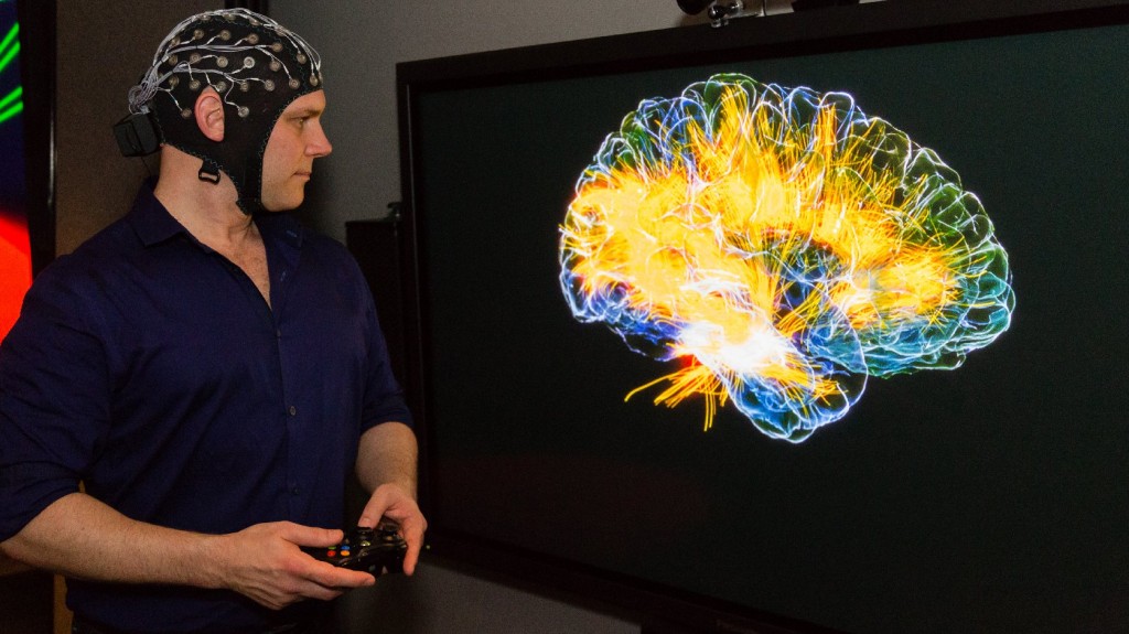 The "glass brain" projects EEG data onto an MRI scan of the player's brain. (Josh Cassidy/KQED)