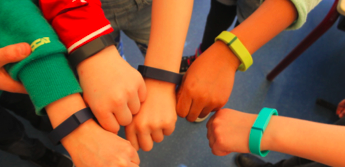 Students wear a variety of activity bands 