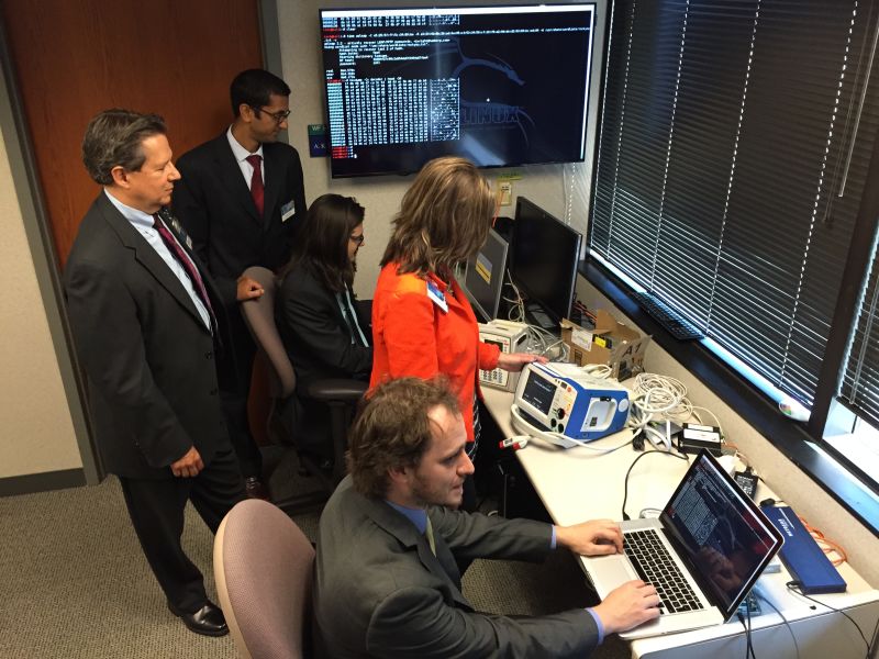 Clinical Information Security Director Kevin McDonald (left) at Mayo Clinic in Minnesota leads a team checking medical devices for software vulnerabilities that could cause a device to be infected with malware or exploited by hackers.
