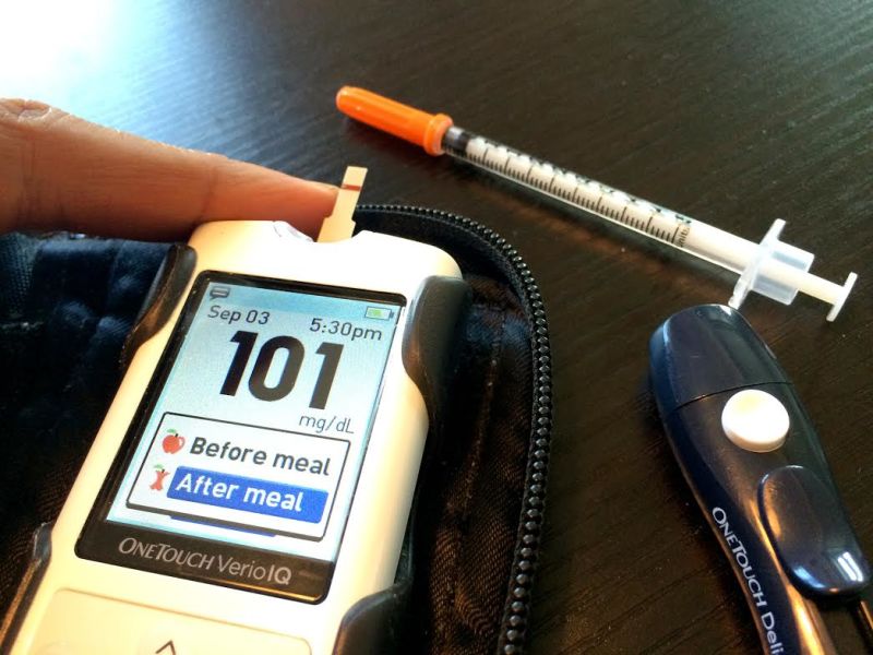 Khambatta regulates his insulin levels with a glucose meter, syringe and lancet. 