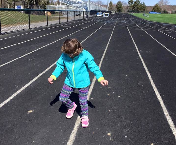 Tess Bigelow stomps it out on the track where she competed in the Special Olympics.