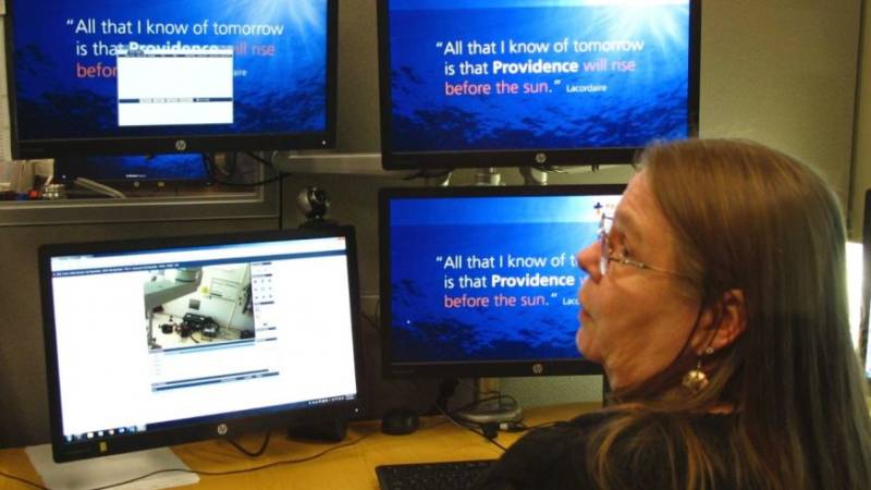 Intensive care unit nurse Deborah Springer in Anchorage, Alaska, demonstrates the focusing ability of a telemedicine camera that is part of a new telemedicine partnership between the Iliuliuk Family and Health Services on Unalaska Island and Providence Alaska Medical Center.